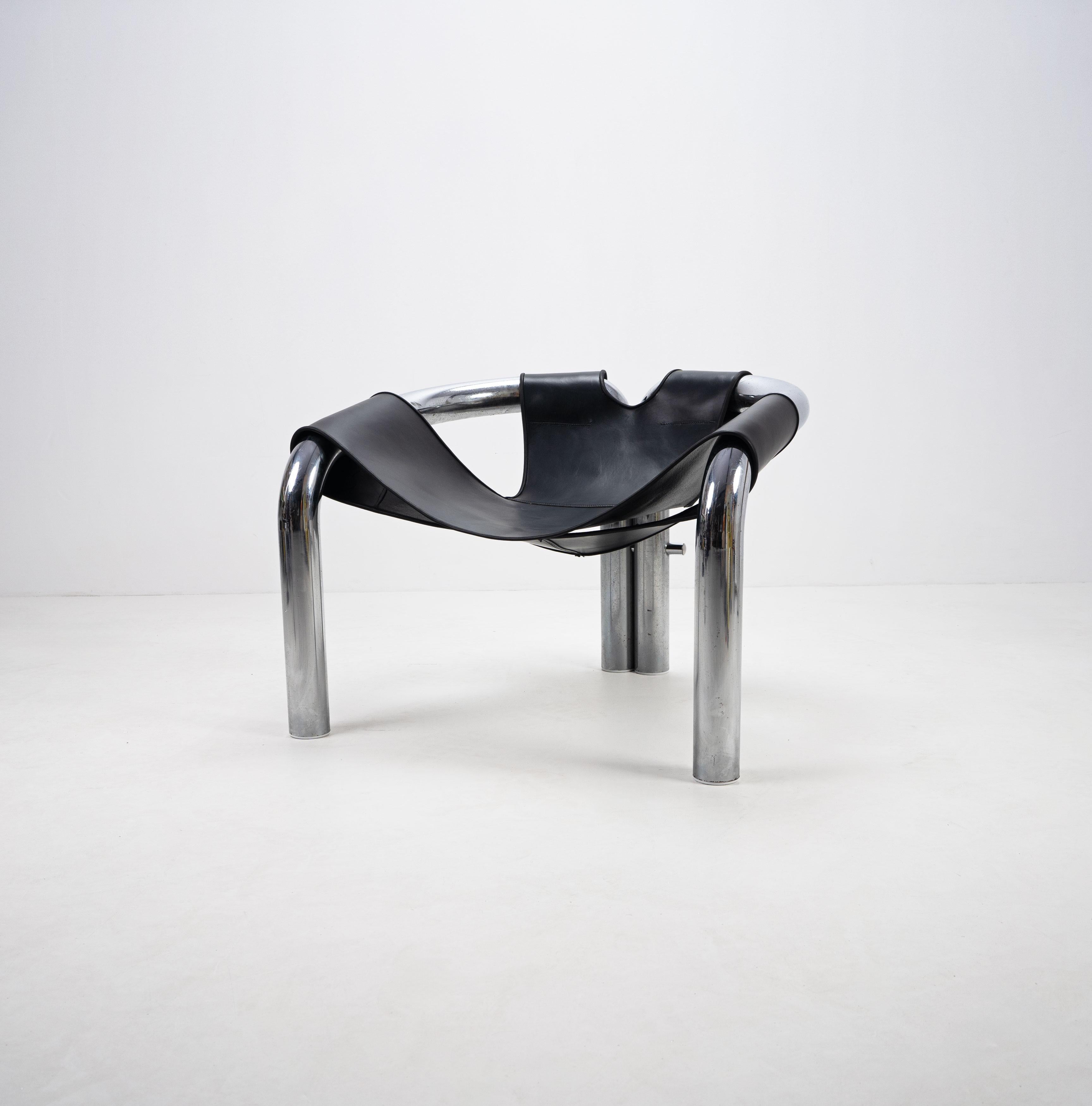 A lounge chair designed by Byron Botker and produced by Landes, c.1970. Composed from an oversized chromed tubular frame supporting a black leather sling seat. 

The design was featured in the CA Design 11 exhibition in 1971 and is part of the