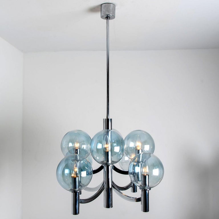 Chrome and Light Blue Glass Chandelier in the style of Arne Jakobsson