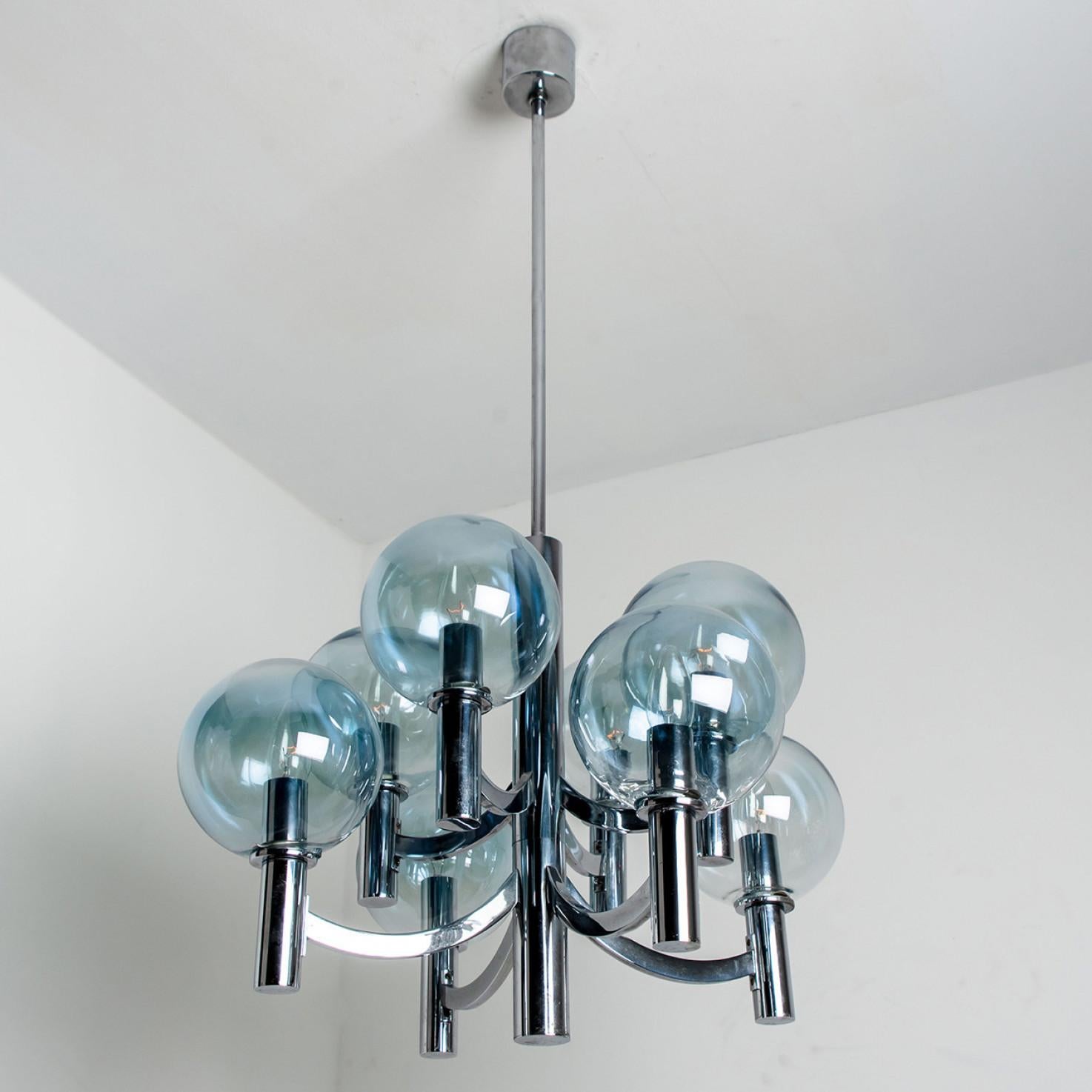 German Chrome and Light Blue Glass Chandelier in the style of Arne Jakobsson, 1970s For Sale