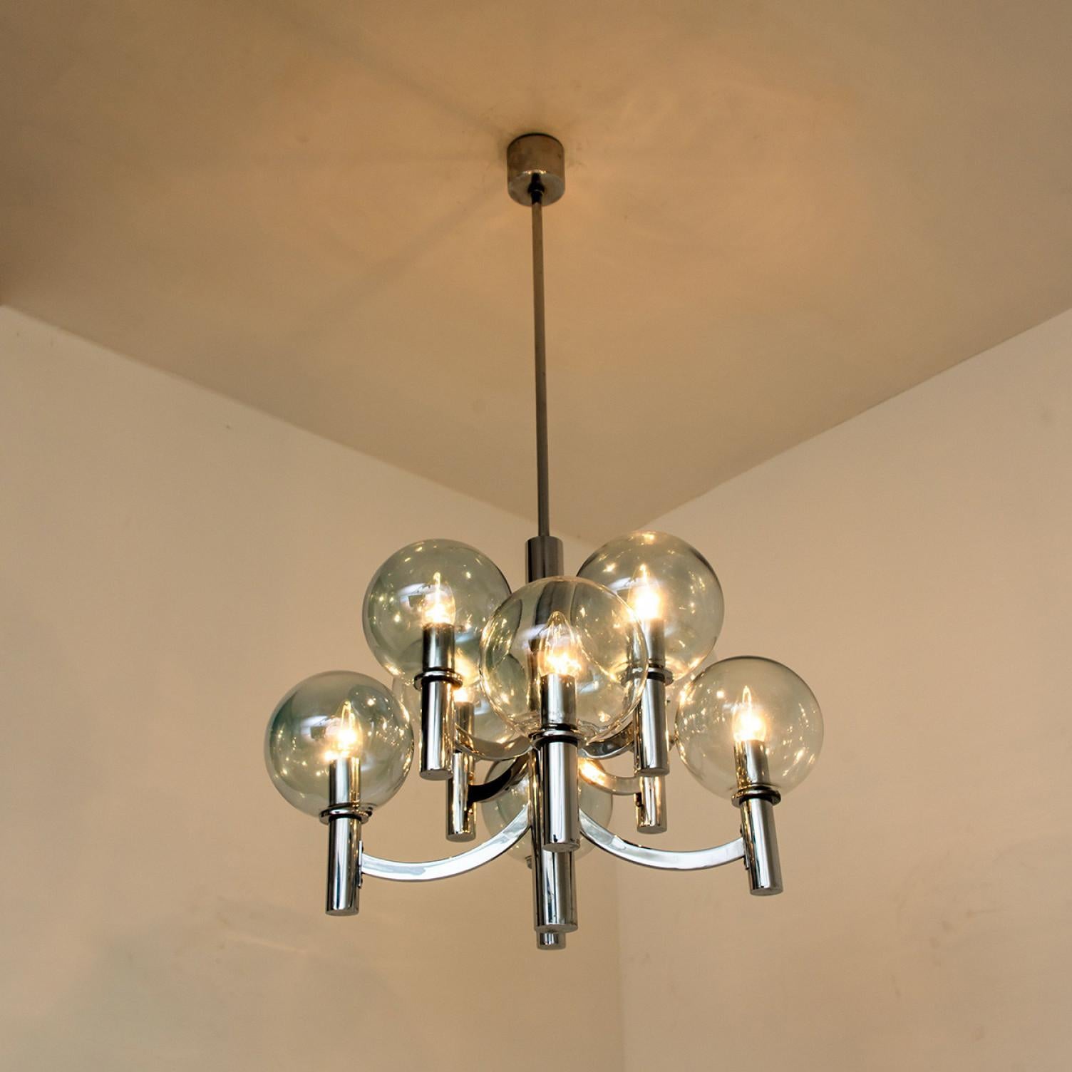 Chrome and Light Blue Glass Chandelier in the style of Arne Jakobsson, 1970s In Good Condition For Sale In Rijssen, NL
