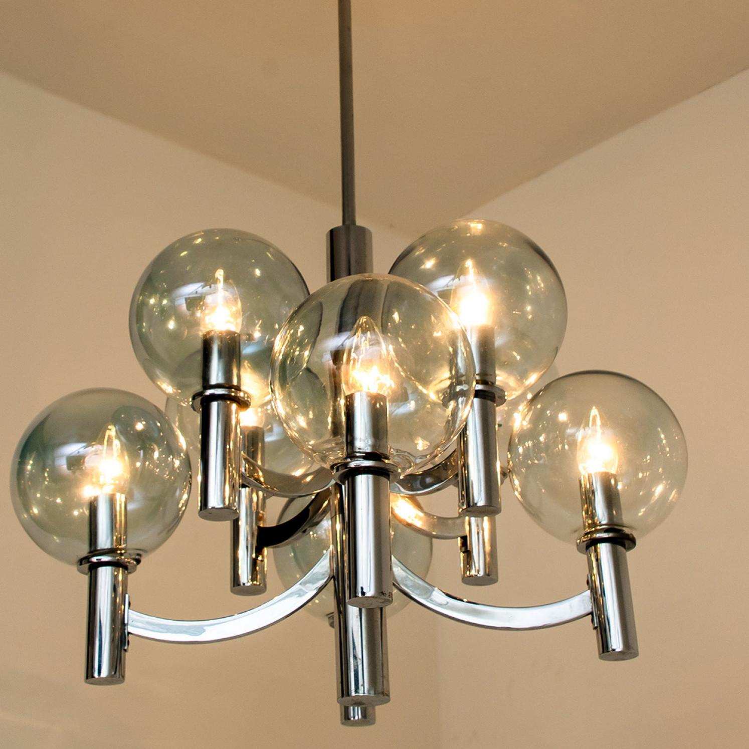 Art Glass Chrome and Light Blue Glass Chandelier in the style of Arne Jakobsson, 1970s For Sale
