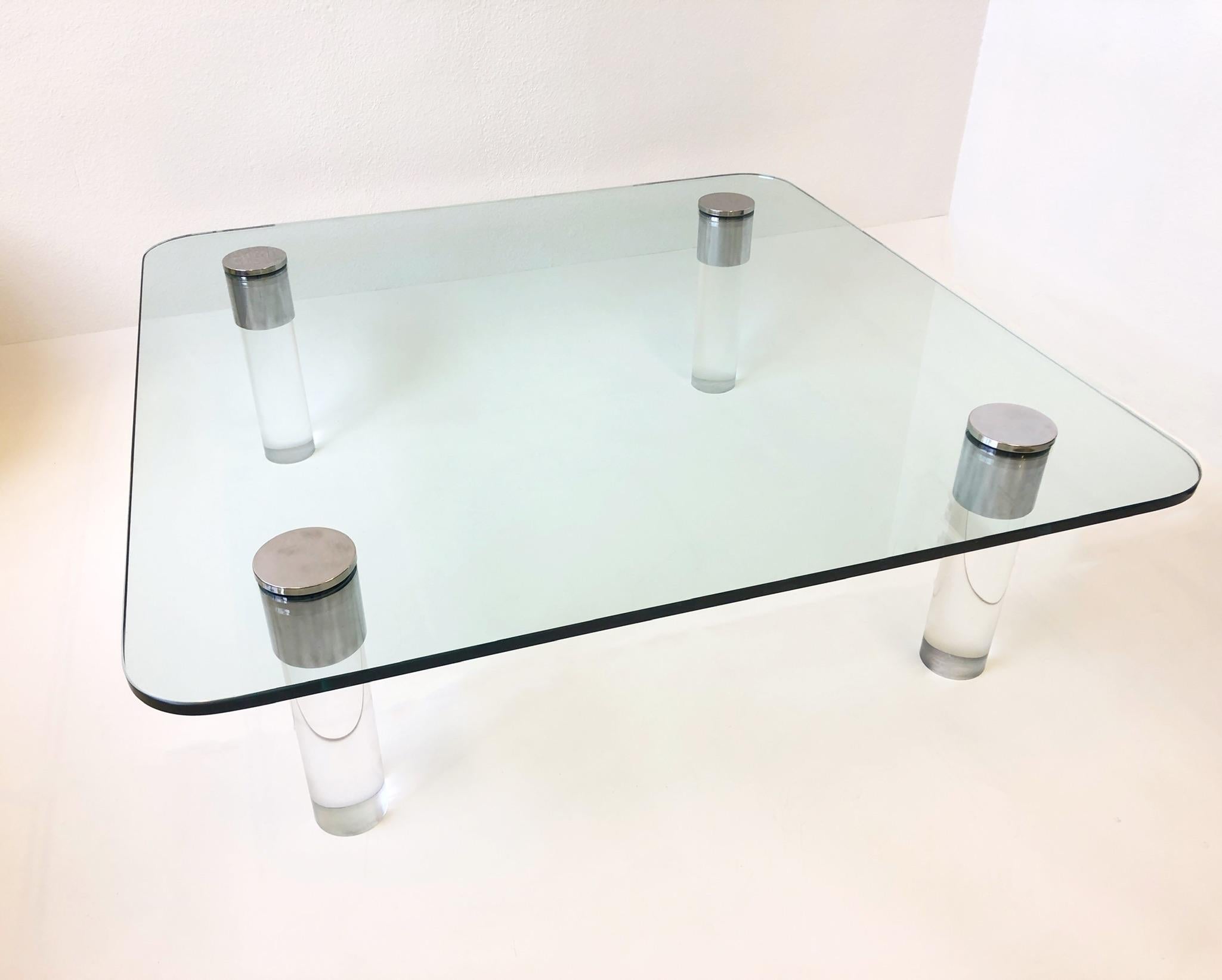 Large 1970’s lucite and chrome with 3/4” thick glass top cocktail table by Pace Collection.
The legs have been newly professionally polished.
The glass is original, has no chips, shows minor wear consistent with age.
Measurements: 54” wide, 54”