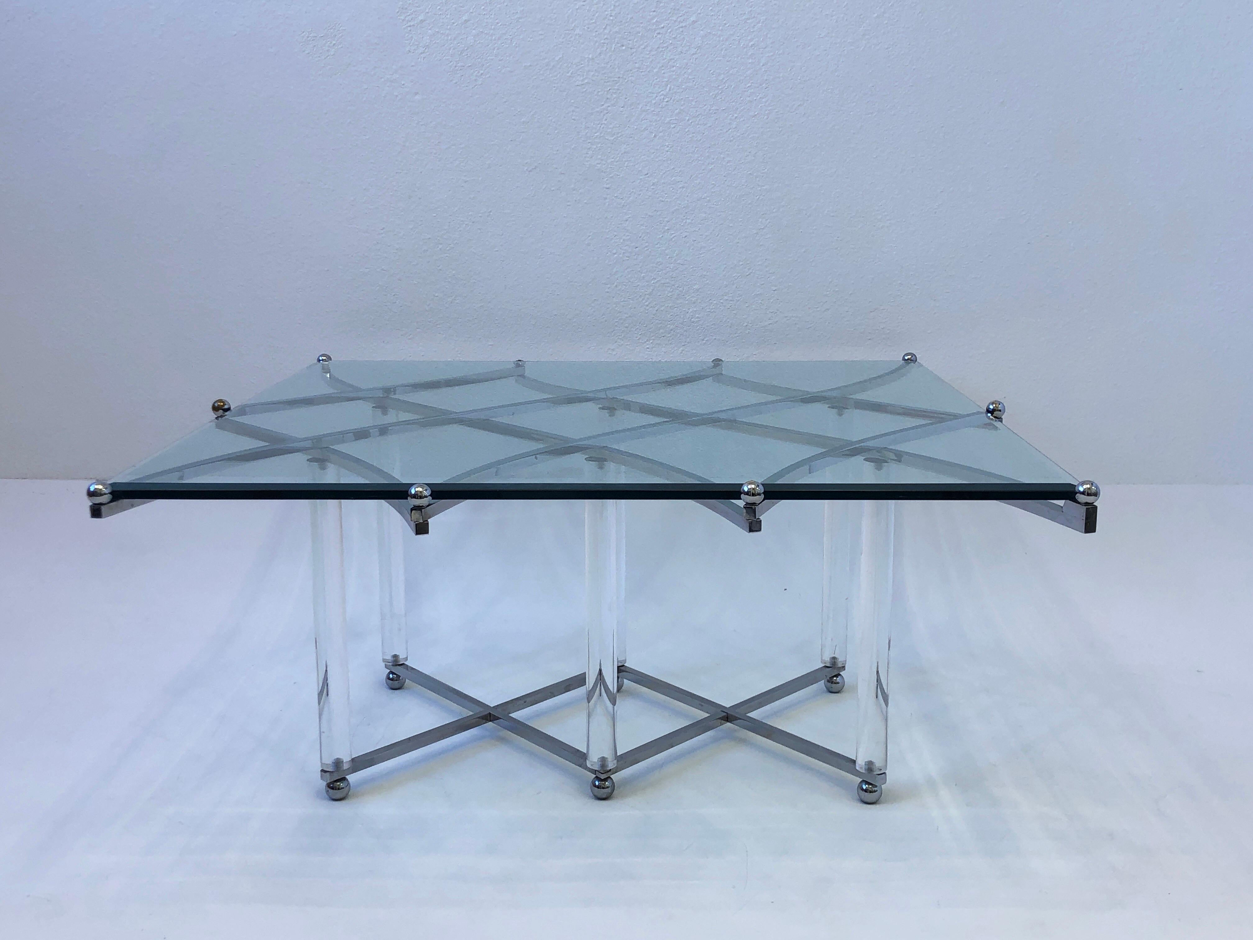 1970’s glamorous ‘Treillage’ cocktail table by renowned American designer Charles Hollis Jones. 
In original condition, so it shows minor wear consistent with age. 
The 8th photos is of CHJ with table.
Constructed of polish chrome and clear