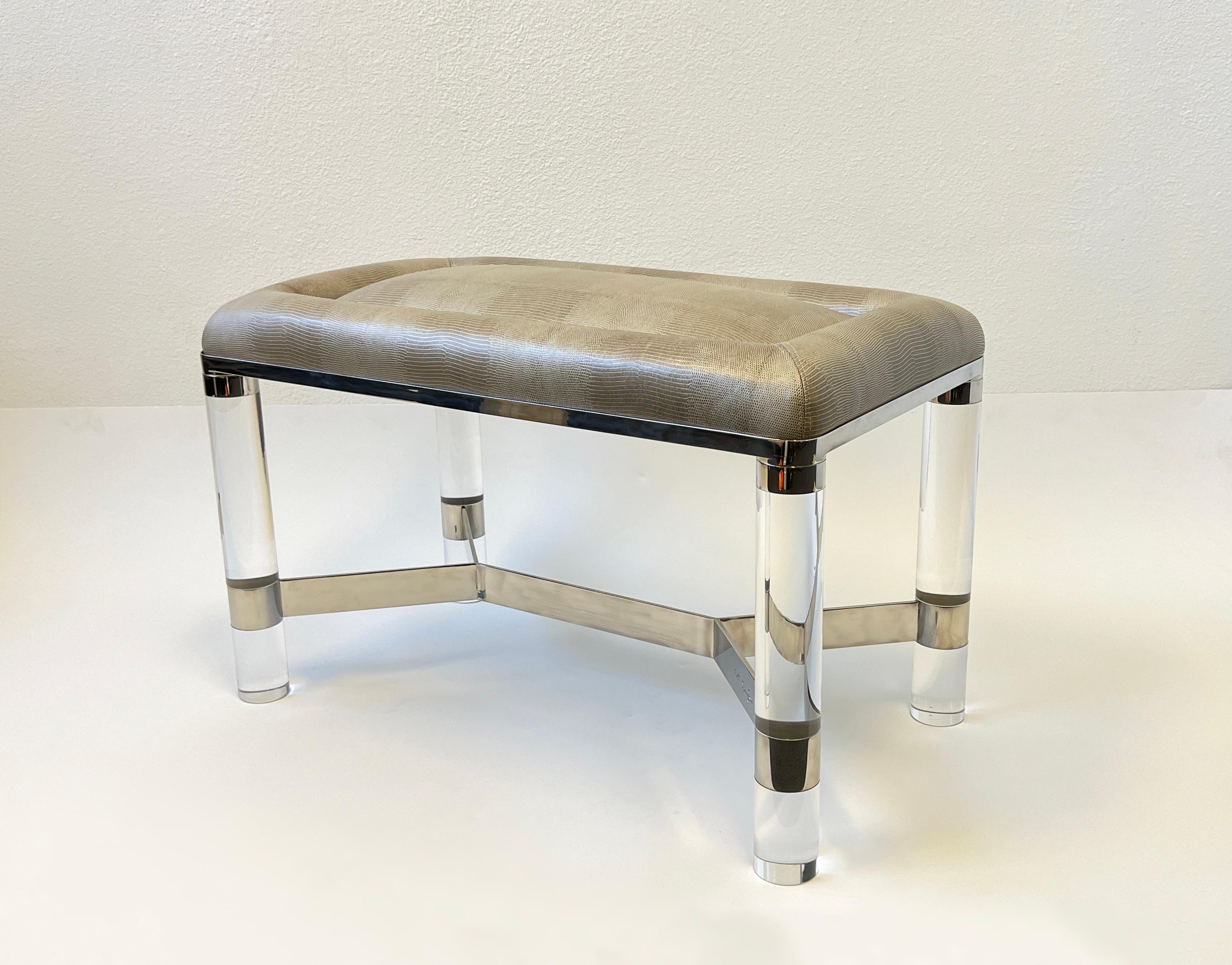 Glamorous 1980’s clear acrylic and polish chrome with Italian snakeskin embossed leather bench 
By renowned designer Karl Springer (1931 - 1991). 
Newly recovered. 
The bench has the signature stamped on the base. 
In beautiful vintage condition
