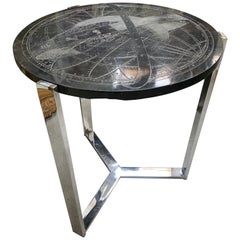 Table en chrome et marbre avec sphère céleste gravée