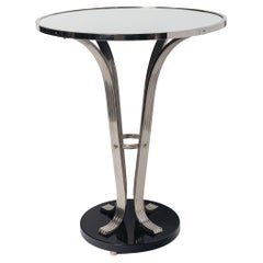 Chrome and mirror side table. France, circa 1940.