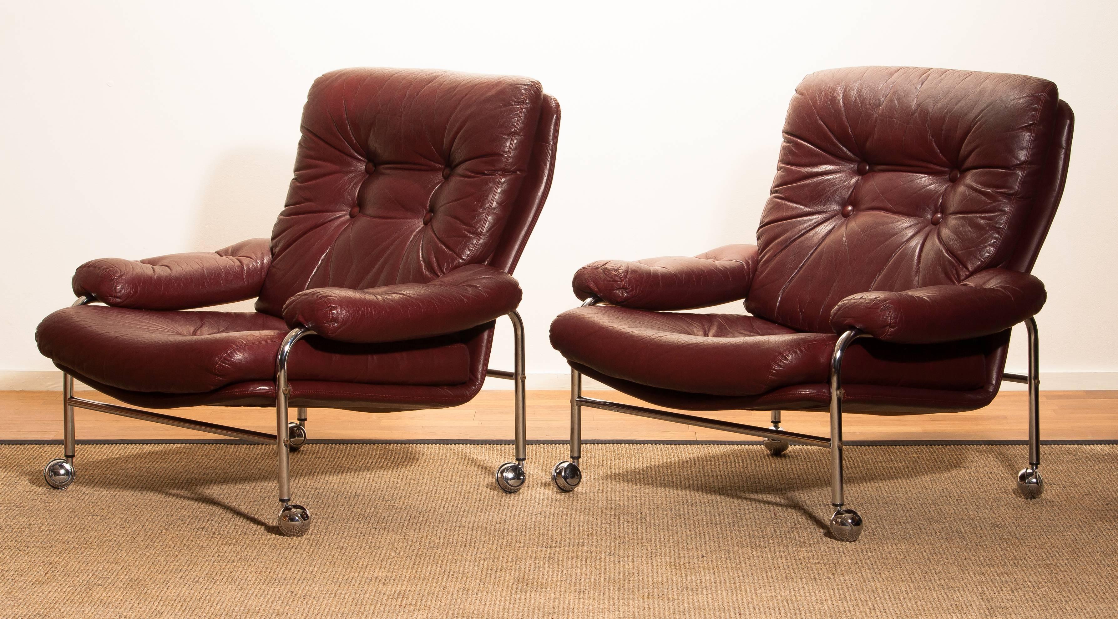 Late 20th Century Chrome and Oxen Blood Red Leather Easy / Lounge Chairs by Scapa Rydaholm, Sweden