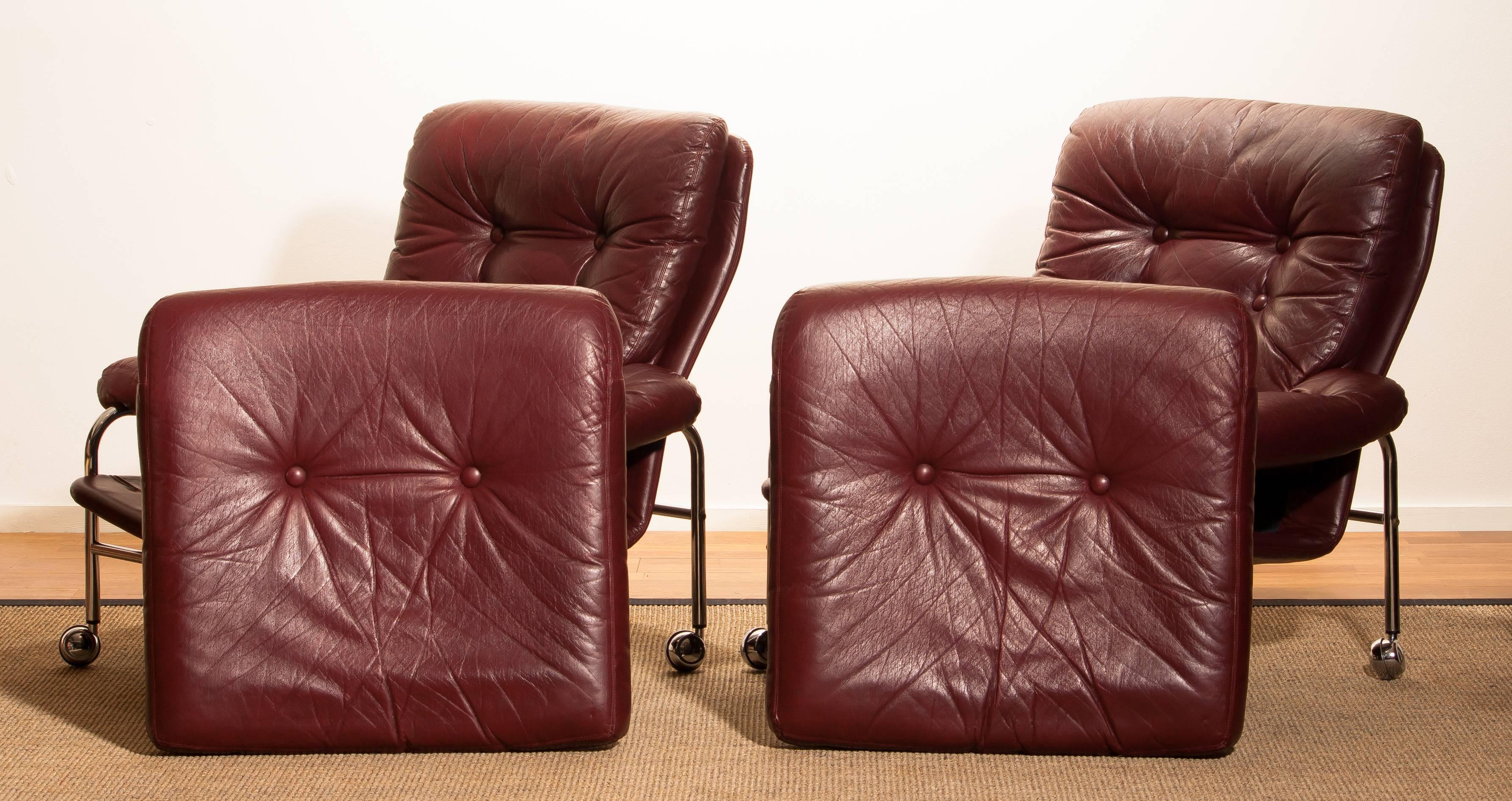 Chrome and Oxen Blood Red Leather Easy / Lounge Chairs by Scapa Rydaholm, Sweden 1