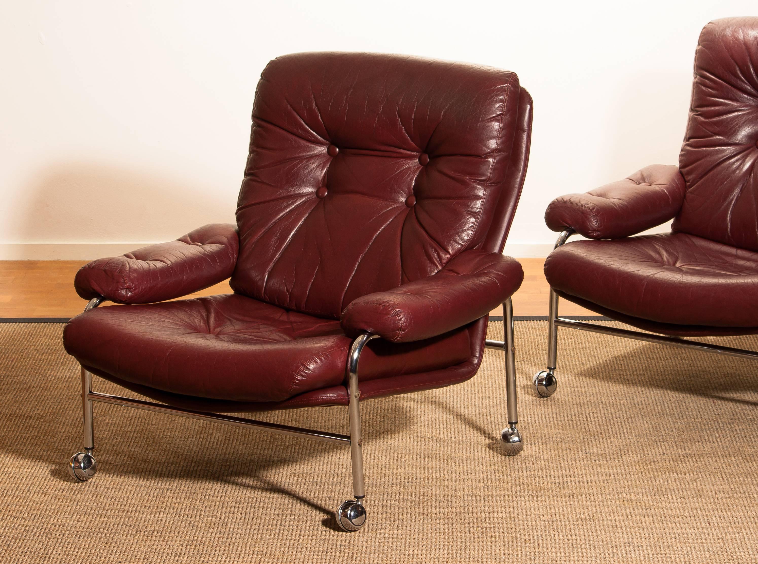 Chrome and Oxen Blood Red Leather Easy / Lounge Chairs by Scapa Rydaholm, Sweden 2
