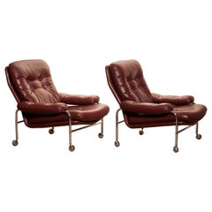 Chrome and Oxen Blood Red Leather Easy / Lounge Chairs by Scapa Rydaholm, Sweden