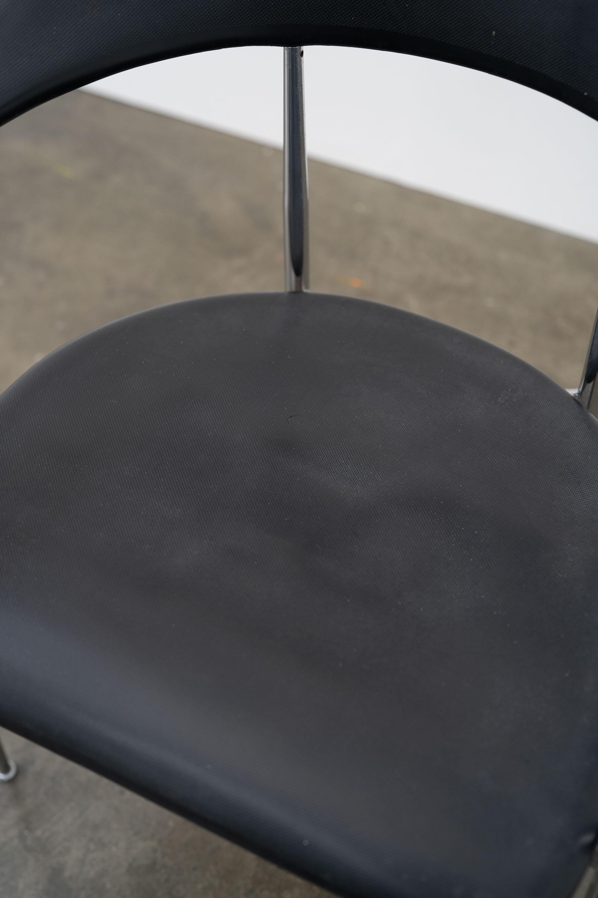 A 'P40' dining chair designed by Giancarlo Vegni & Gianfranco Gualtierotti and manufactured by Fasem, composed from a chrome plated steel frame and black rubber upholstery.

Dimensions (cm, approx):
Height: 74
Width: 62
Depth: 52

Condition: In good