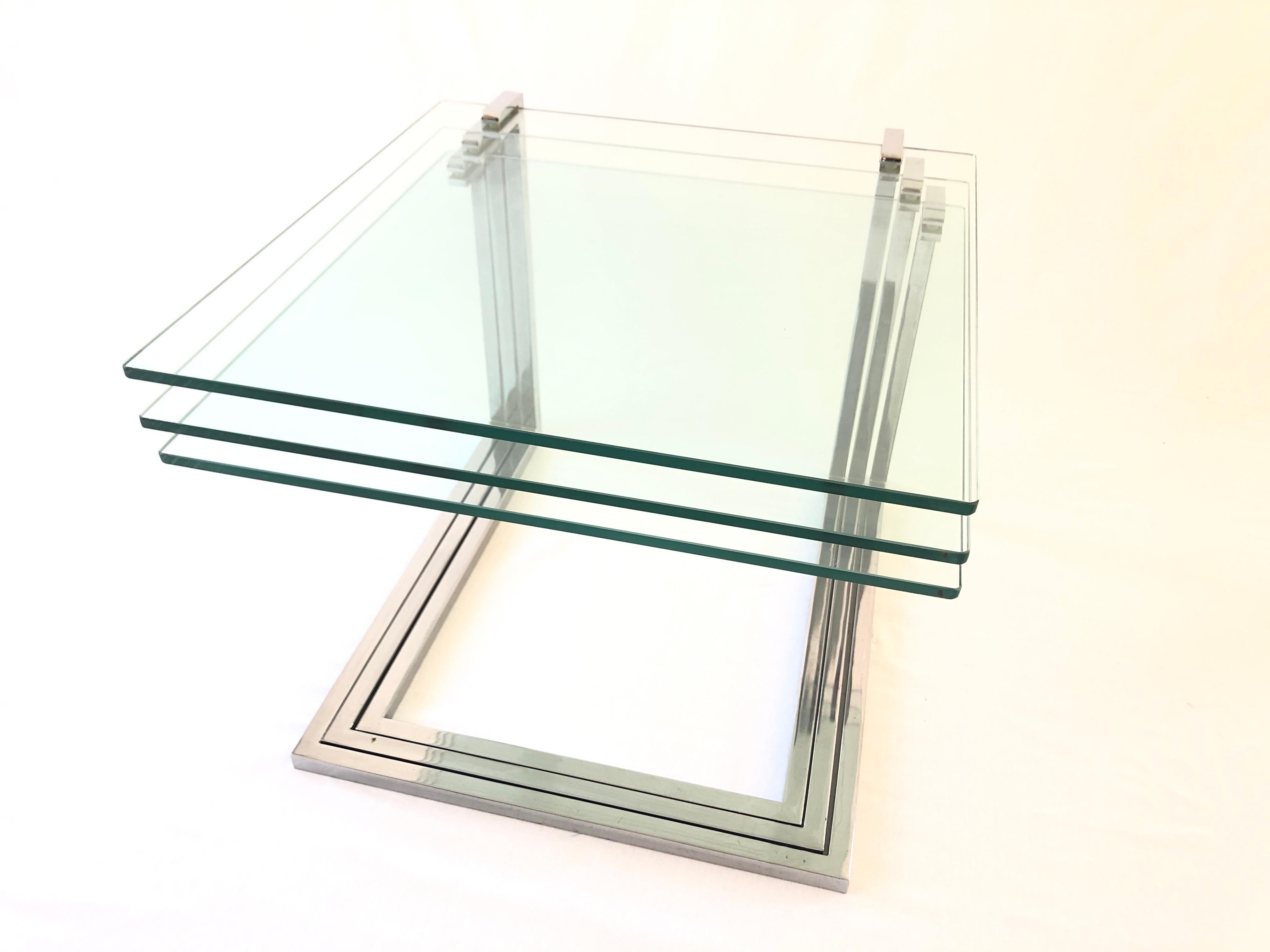 Chrome and Thick Glass Set of 3 Nesting Tables, 1970s, Germany

Measurtements :

55 cm x 55 cm x 45 cm

Please do not hesitate to ask us if you have any questions.