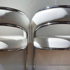 Chrome and white leather chairs by Contemporary Shells, circa 1970
