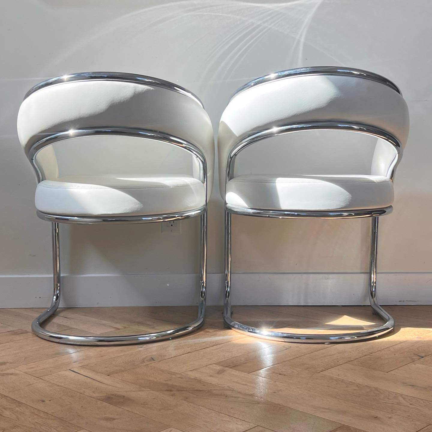 Faux Leather Chrome and white leather chairs by Contemporary Shells, circa 1970