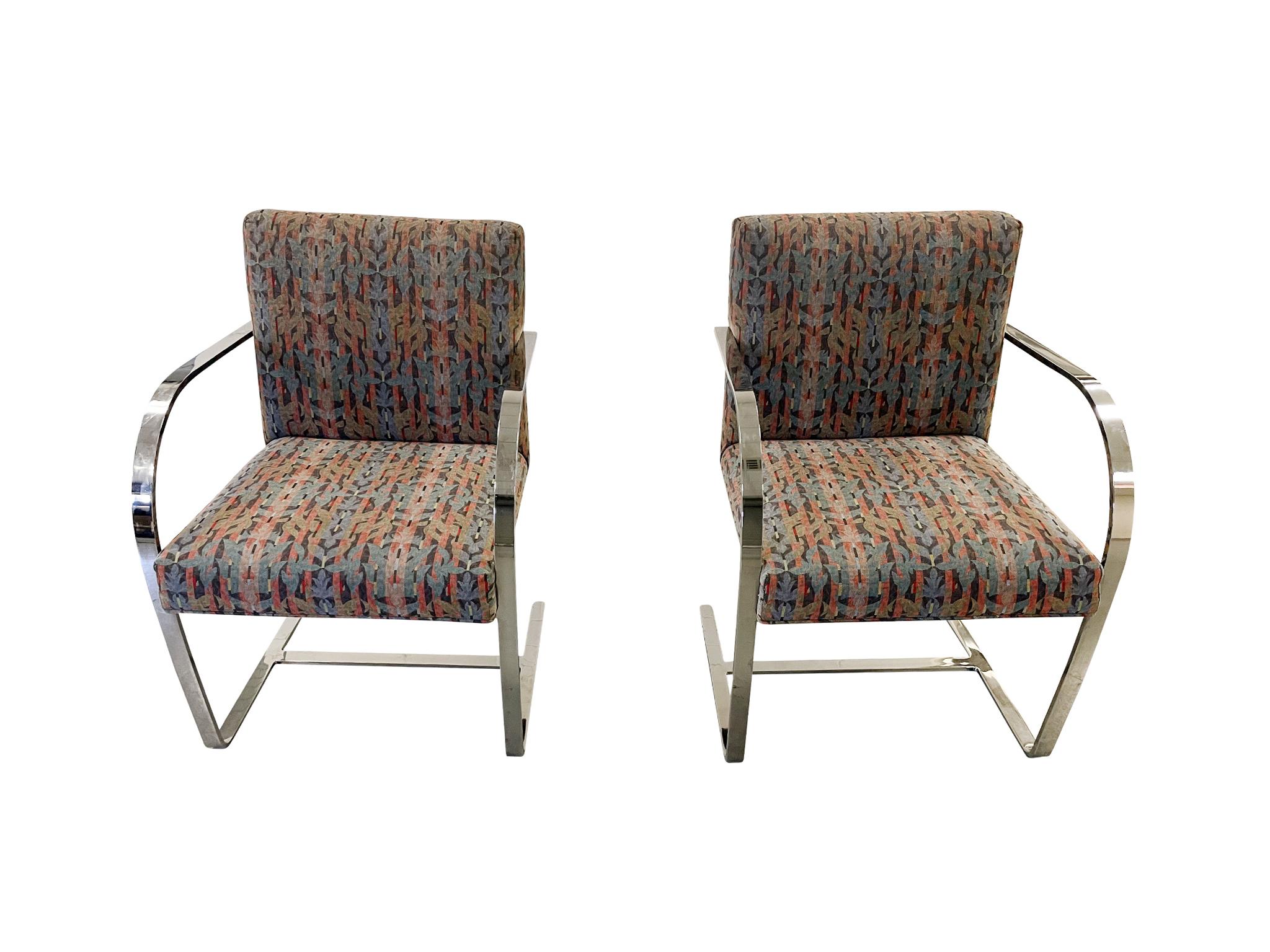 Set consisting of 6 chrome armchairs attributed to Ludwig Mies van der Rohe. Originally designed in the 1930s, the Brno chairs are iconic for their flat-bar chrome cantilever structure. These particular chairs are upholstered in a multi-colored