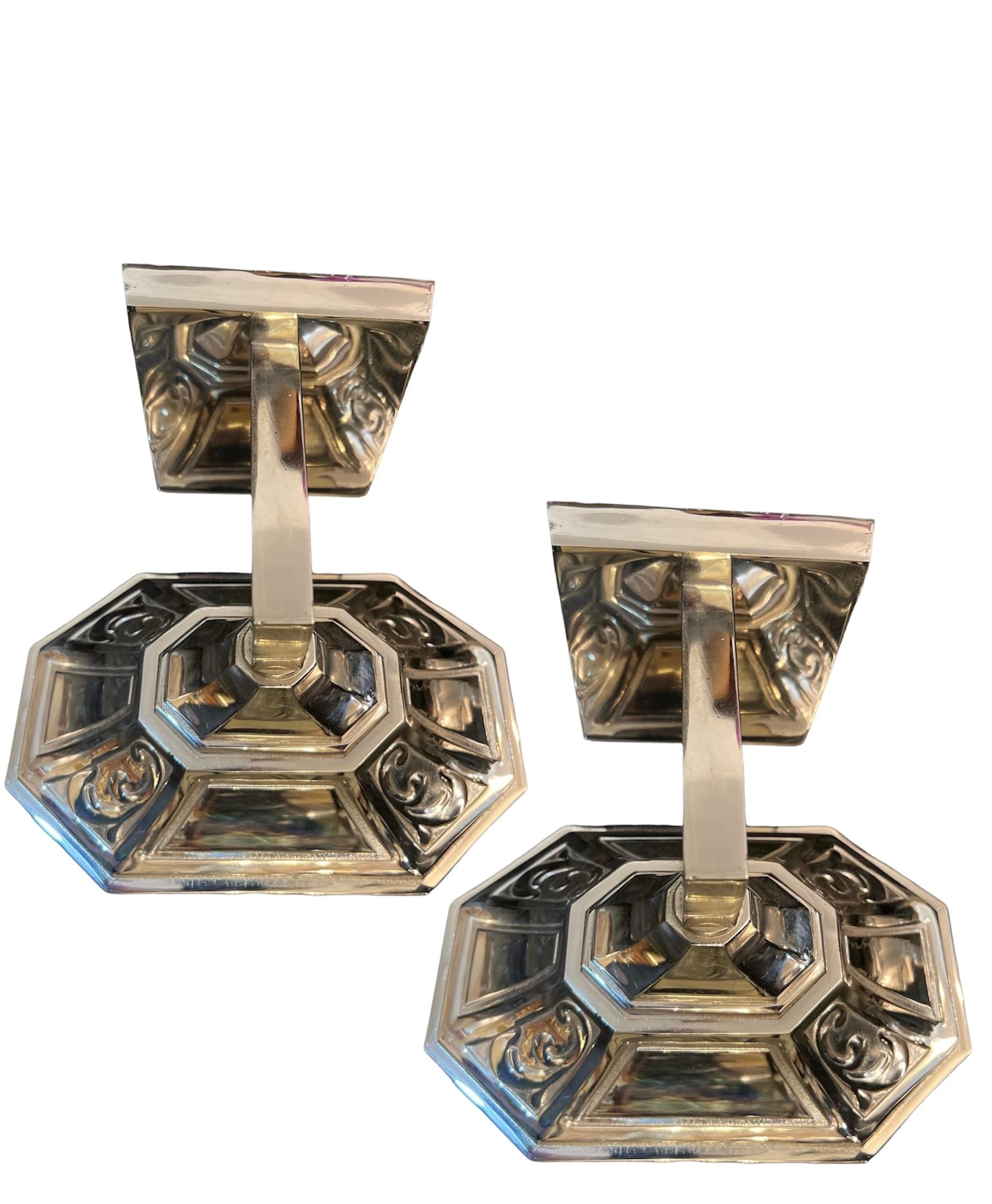 Crafted from high-quality chrome, the sconces feature intricate detailing and flowing lines characteristic of the Art Nouveau movement. The chrome finish not only enhances their aesthetic appeal but also ensures durability and a brilliant shine that