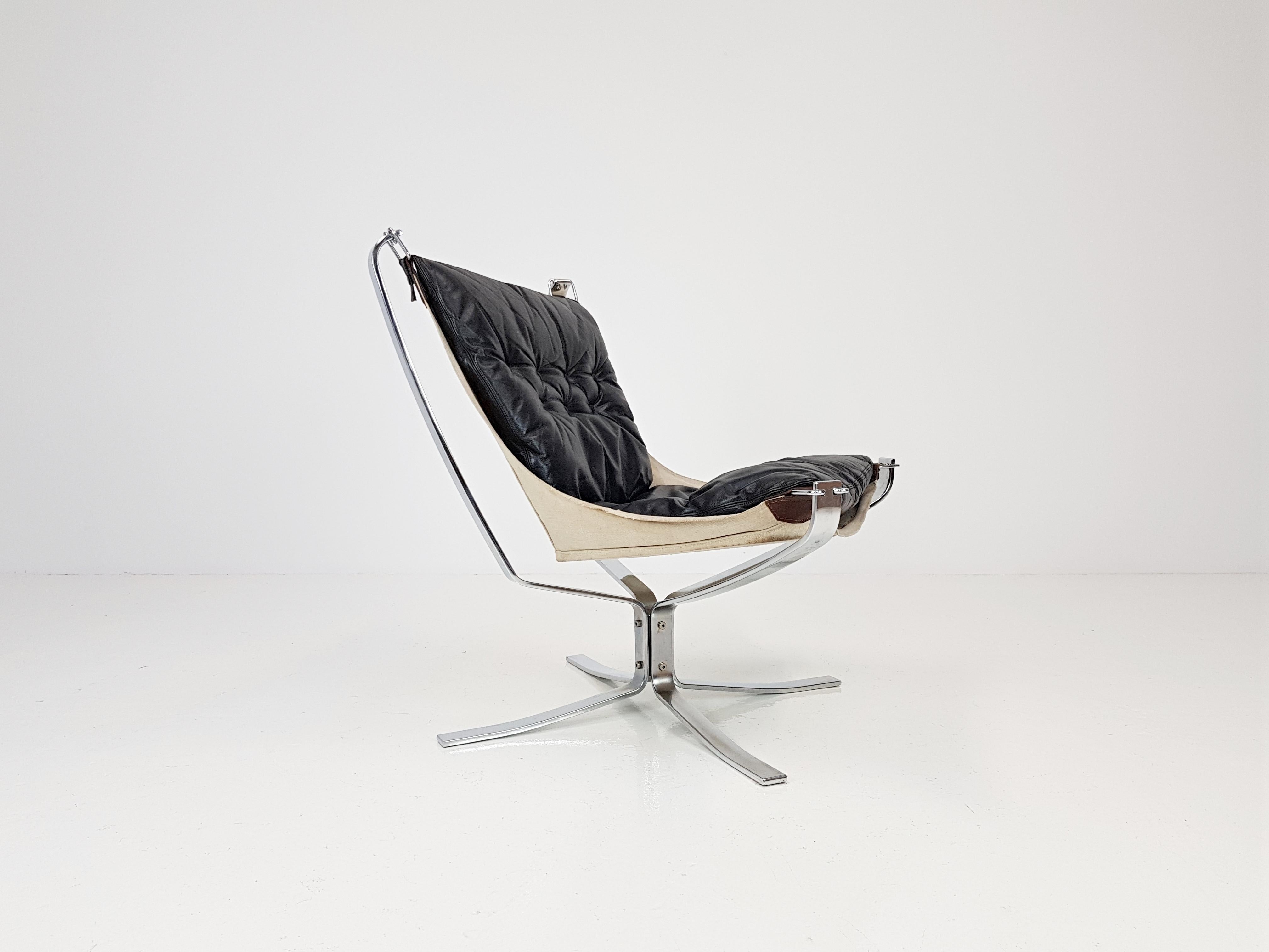 Iconic vintage low-backed X framed Sigurd Ressell designed 1970s Falcon chair on chrome-plated steel base.

A super comfortable, amazing looking 1970s Sigurd Ressell designed iconic Falcon chair. X framed with hammock design. 

A stunning