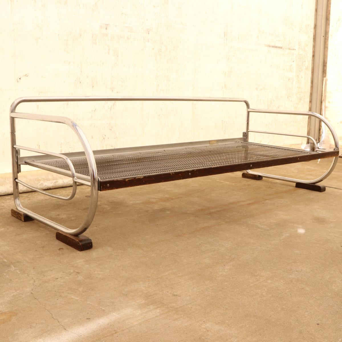 Chromed, tubular steel sofa from the Bauhaus period, 1930s, Bohemia. Made by Hynek Gottwald company. Chrome is in good vintage condition, showing slight signs of aging and using.
It has four wooden legs.