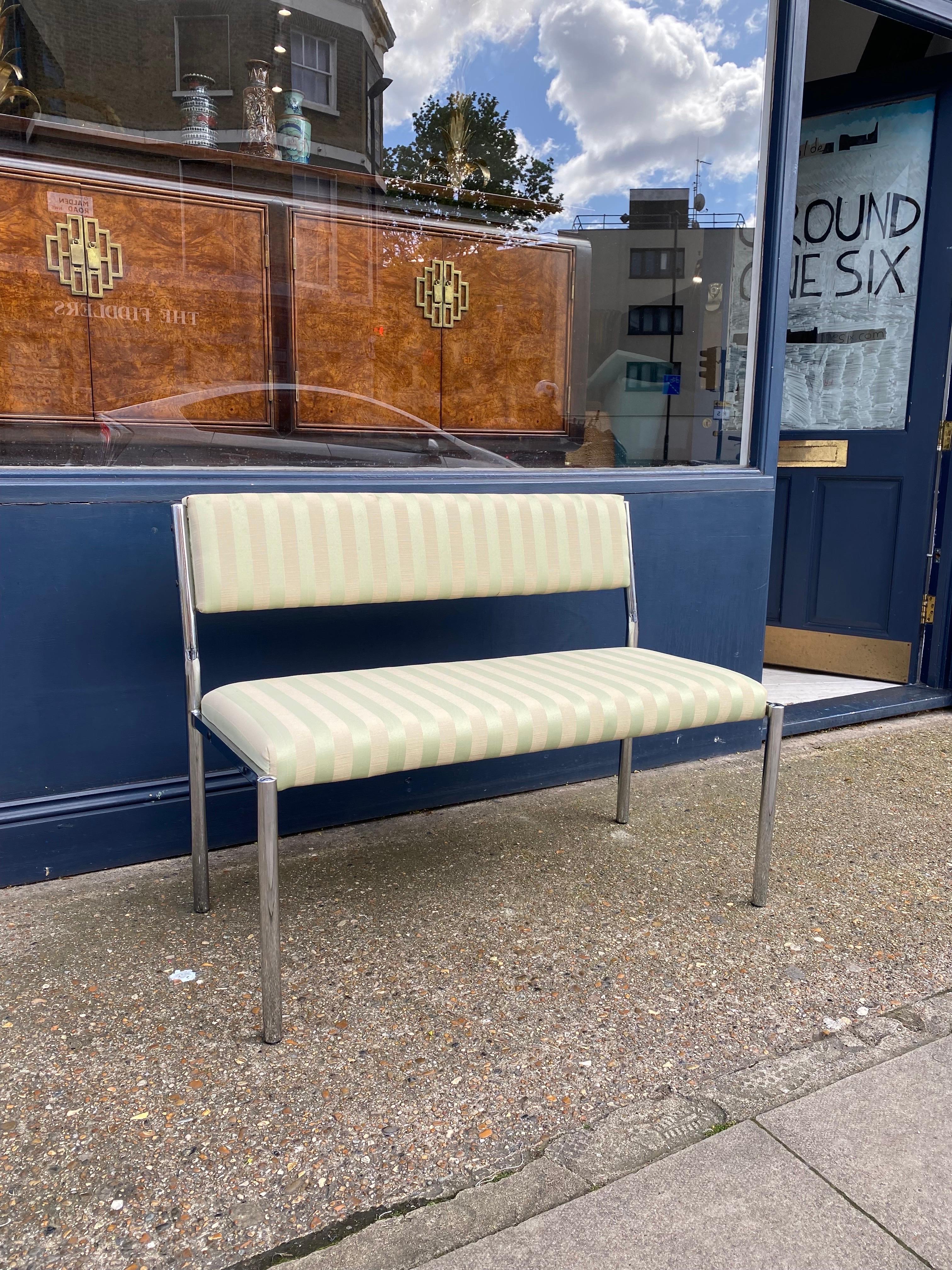 Italian perfectly proportioned and comfortable chrome bench with cotton satin green stripes fabric in a mint shade. Quite difficult to find pleasing benches and we believe this one is just great! 

The tubular chrome steel frame has great