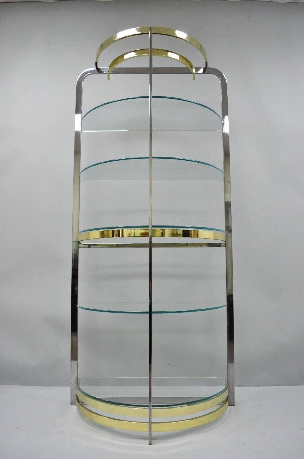 Mid-Century Modern chrome brass and glass half round demilune etagere attributed to Design Institute of America. Item features shapely metal frame, chrome and brass plated finish, great for use with Mid-Century Modern, Art Deco, or contemporary