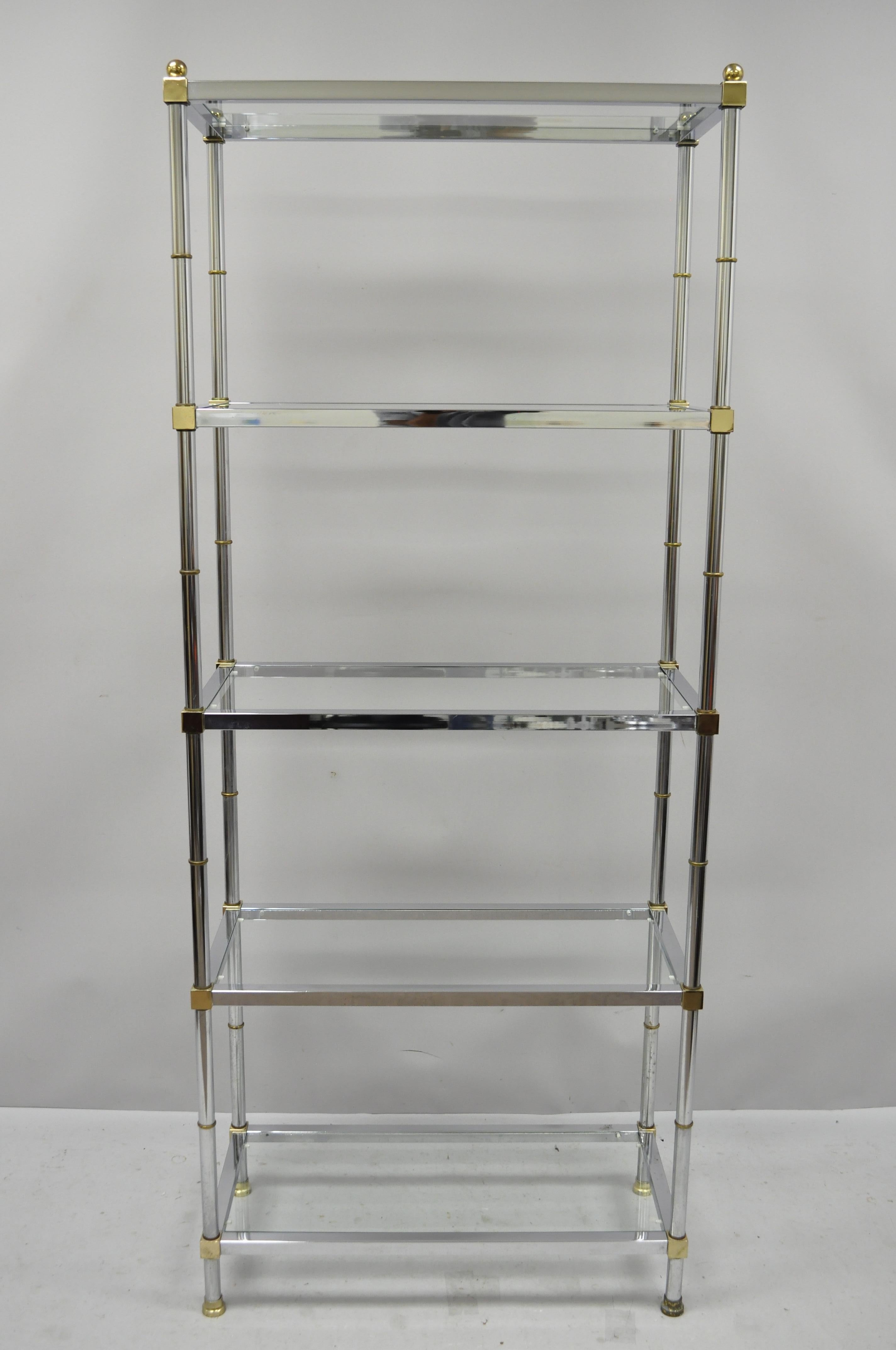 Vintage chrome brass Hollywood Regency Mid-Century Modern étagère display shelf (b). Item features brass accents, glass shelves, faux bamboo design, great style and form, circa mid-late 20th century. Measurements: 73.25