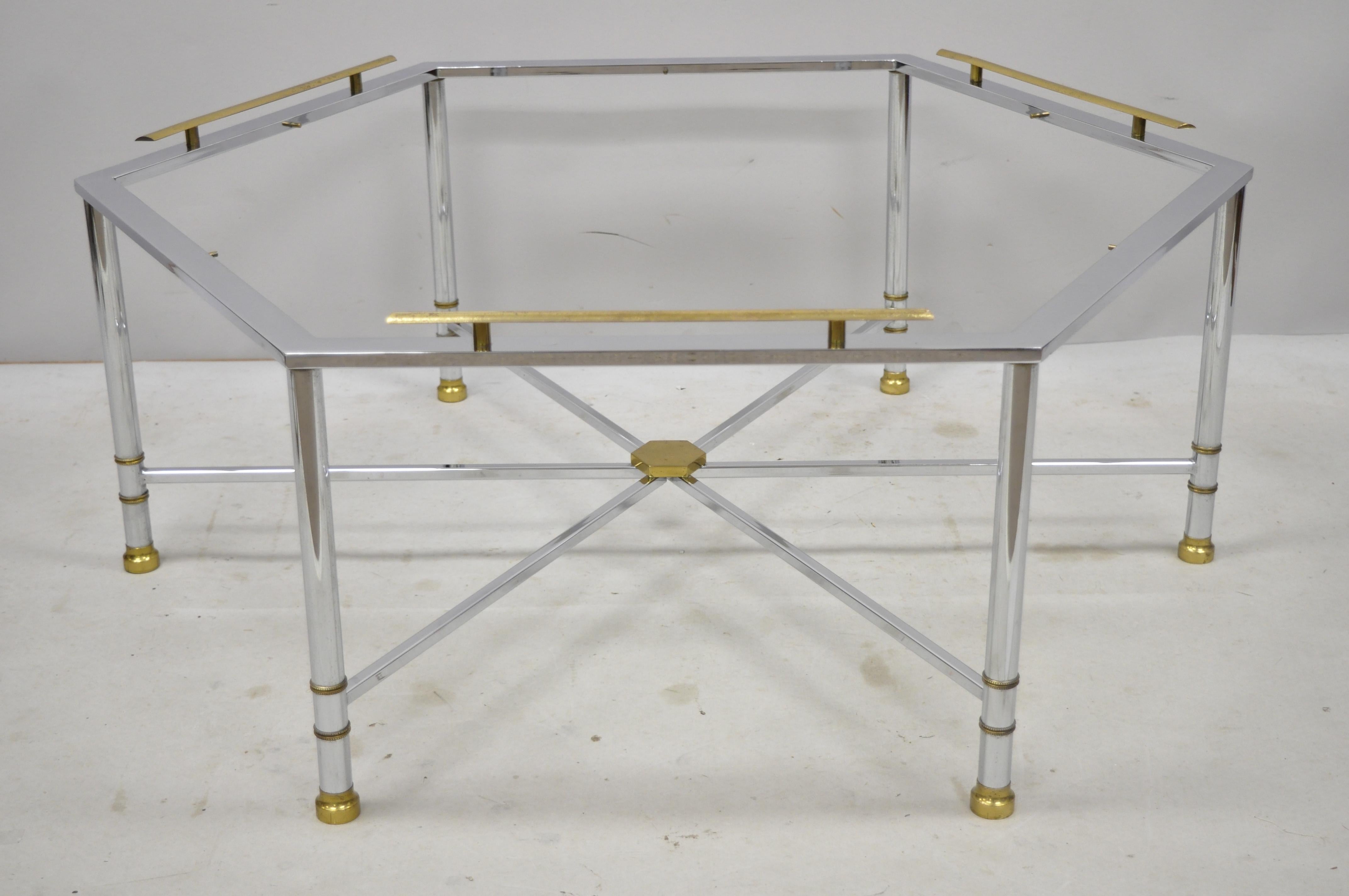 Chrome and brass Maison Jansen style Hexagon Hollywood Regency Directoire coffee table. Item includes solid brass accents, polished chrome frame, stretcher base, brass 