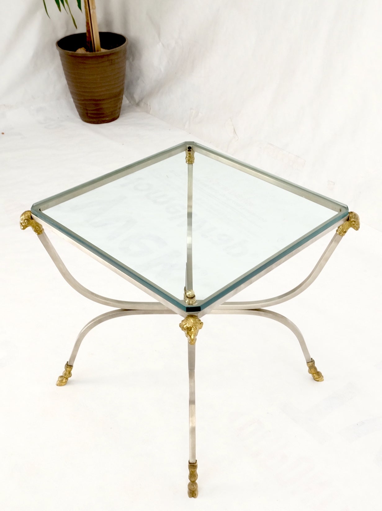 Chrome brass ram heads hoof feet square side end stand table made in Italy mint!
Glass measures .5'' in thickness.