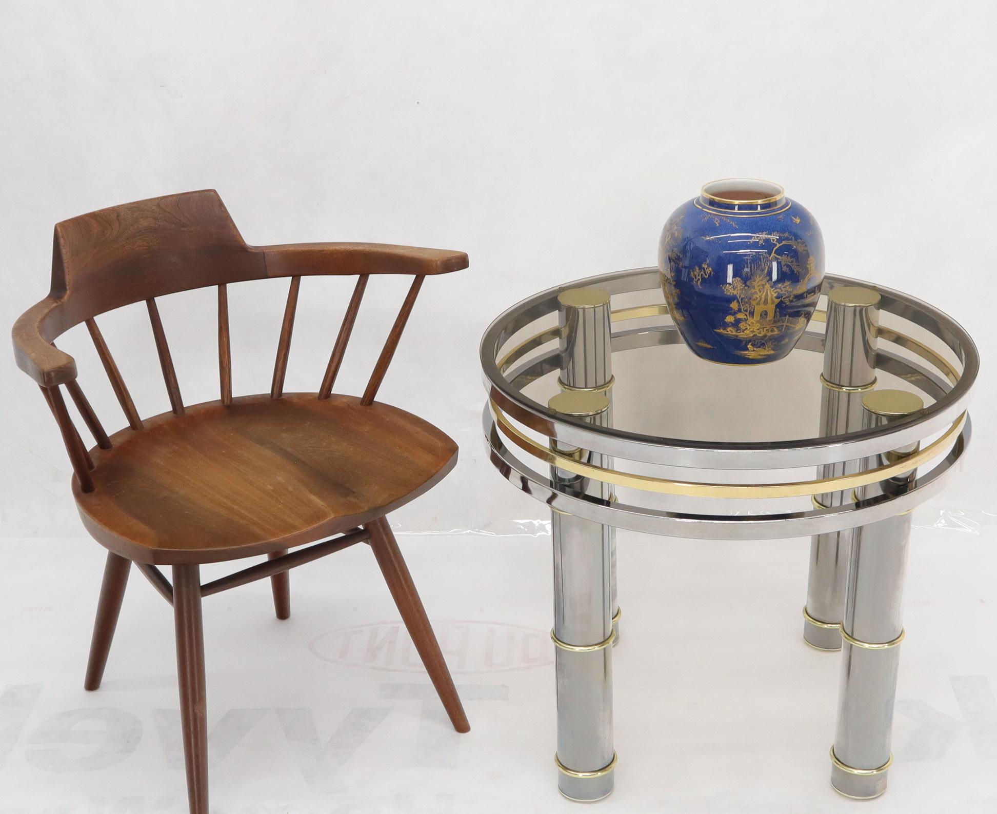 Mid-Century Modern round chrome and smoked glass side end table stand.