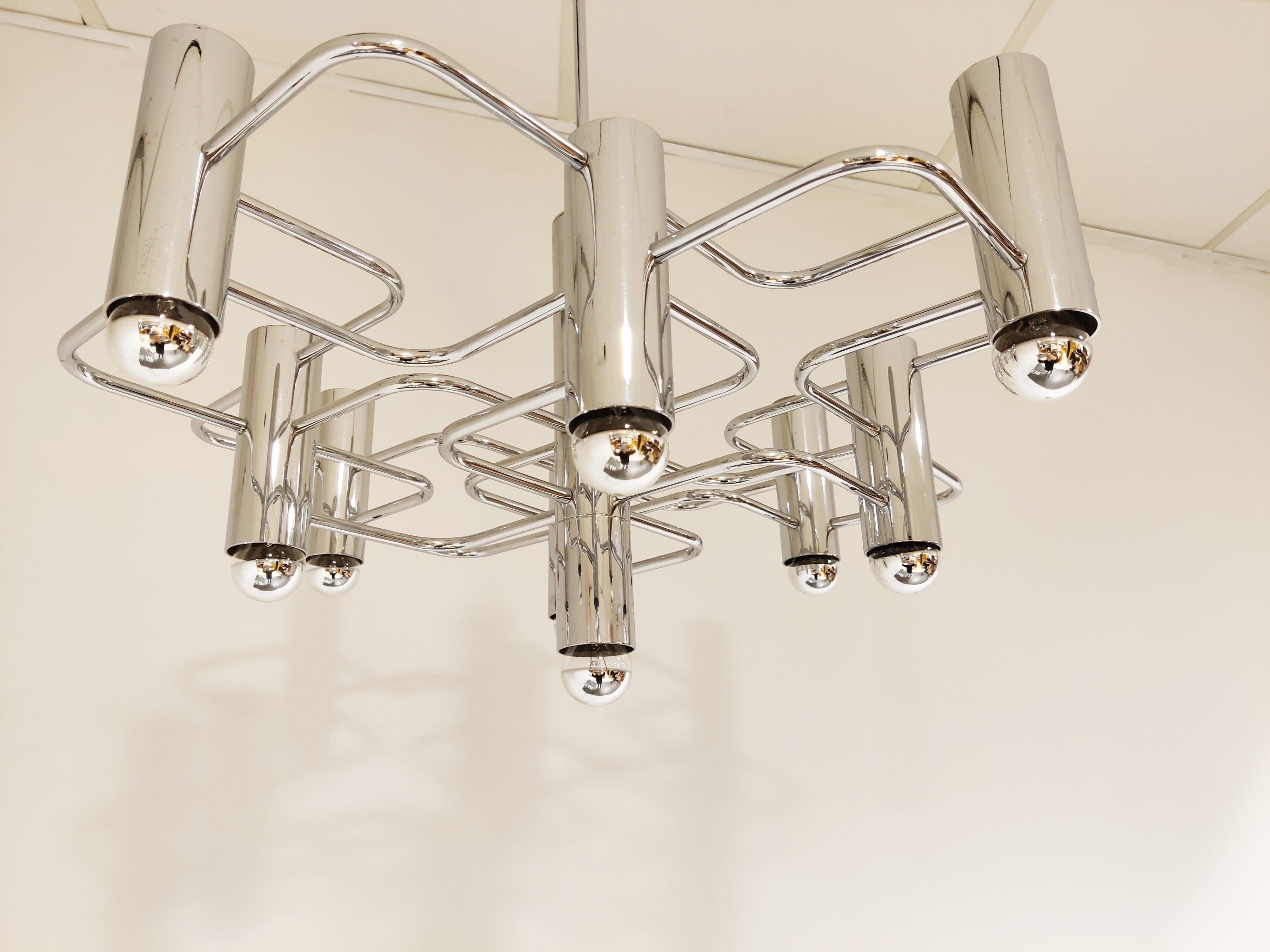 Vintage chrome 9 lightpoint chandelier designed by Gaetano Sciolari for Boulanger.

The chandelier is in good condition and fits in perfectly with moderns day interiors.

1970s - Italy 

Tested and ready for use. The chandelier works with