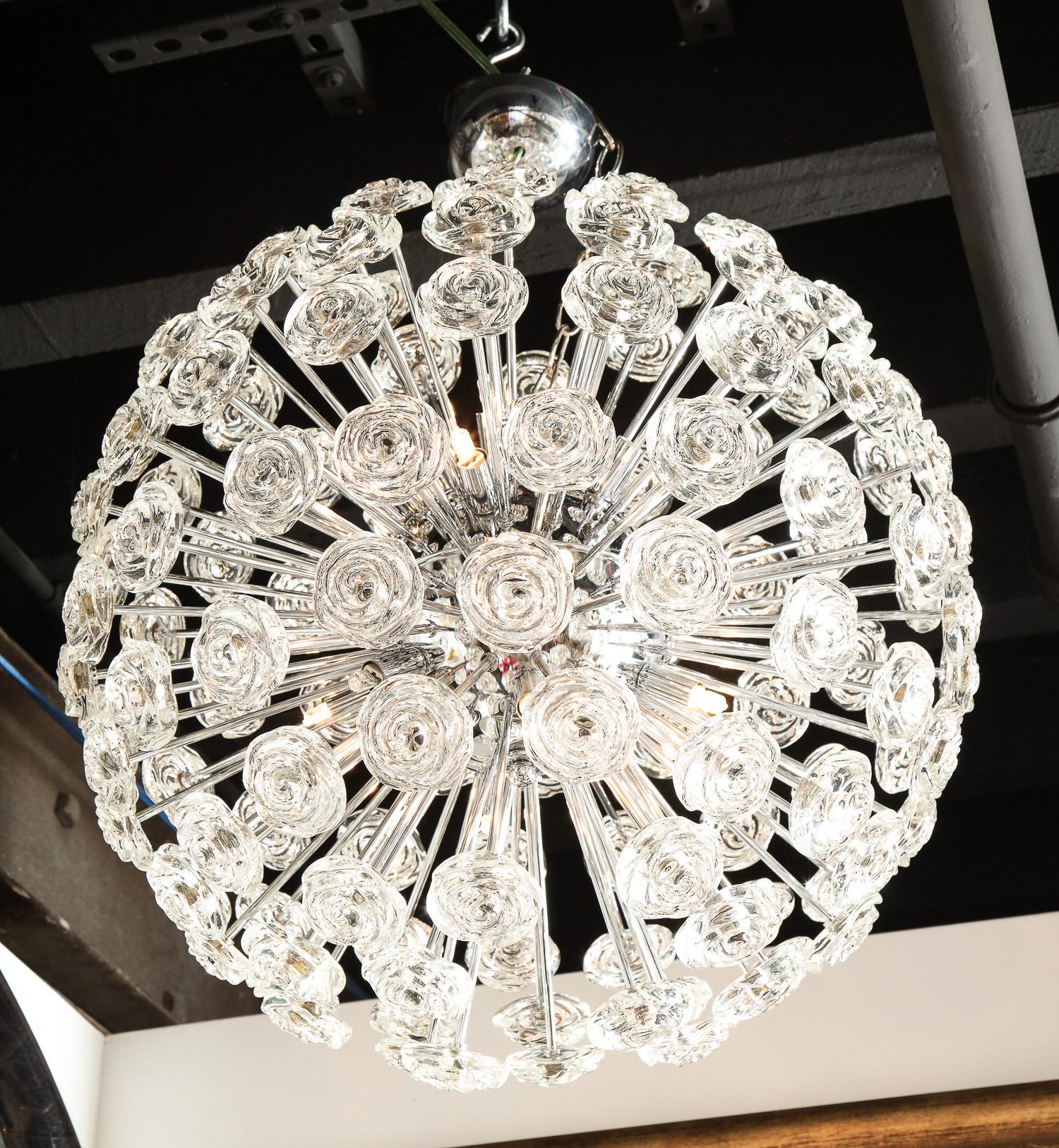 Decorative chrome, midcentury style chandelier with roses made of glass. Murano, Italy.
This chandelier is very elegant. It brings a lot of light into your room. The chandelier has many halogen lights.