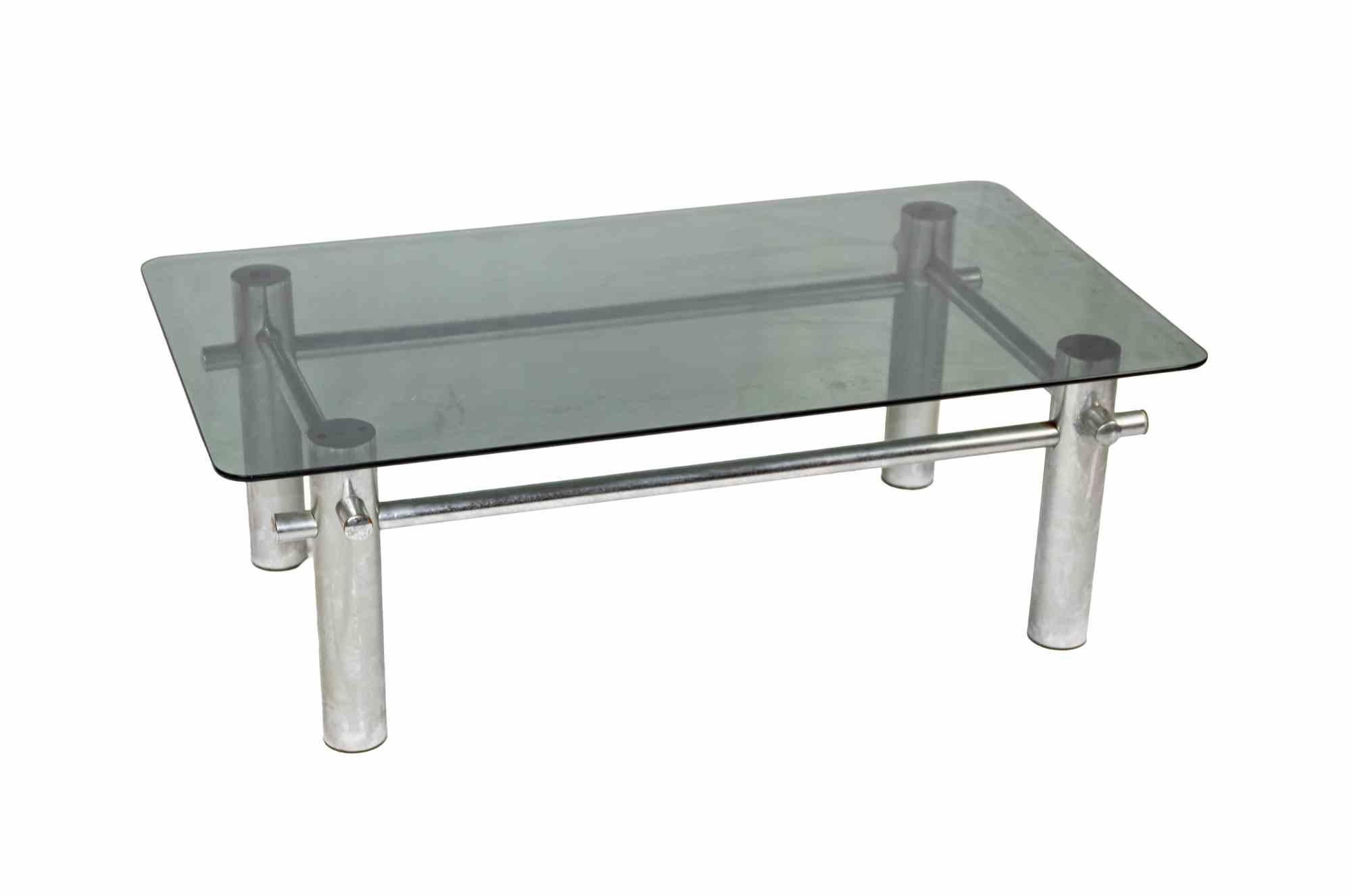 Chrome coffee table is an original design furniture realized in the mid-20th Century.

A coffee table with a grey glass top and metal chrome cylindric legs.

Mint conditions.

A minimal and elegant table perfect for your room!

 
