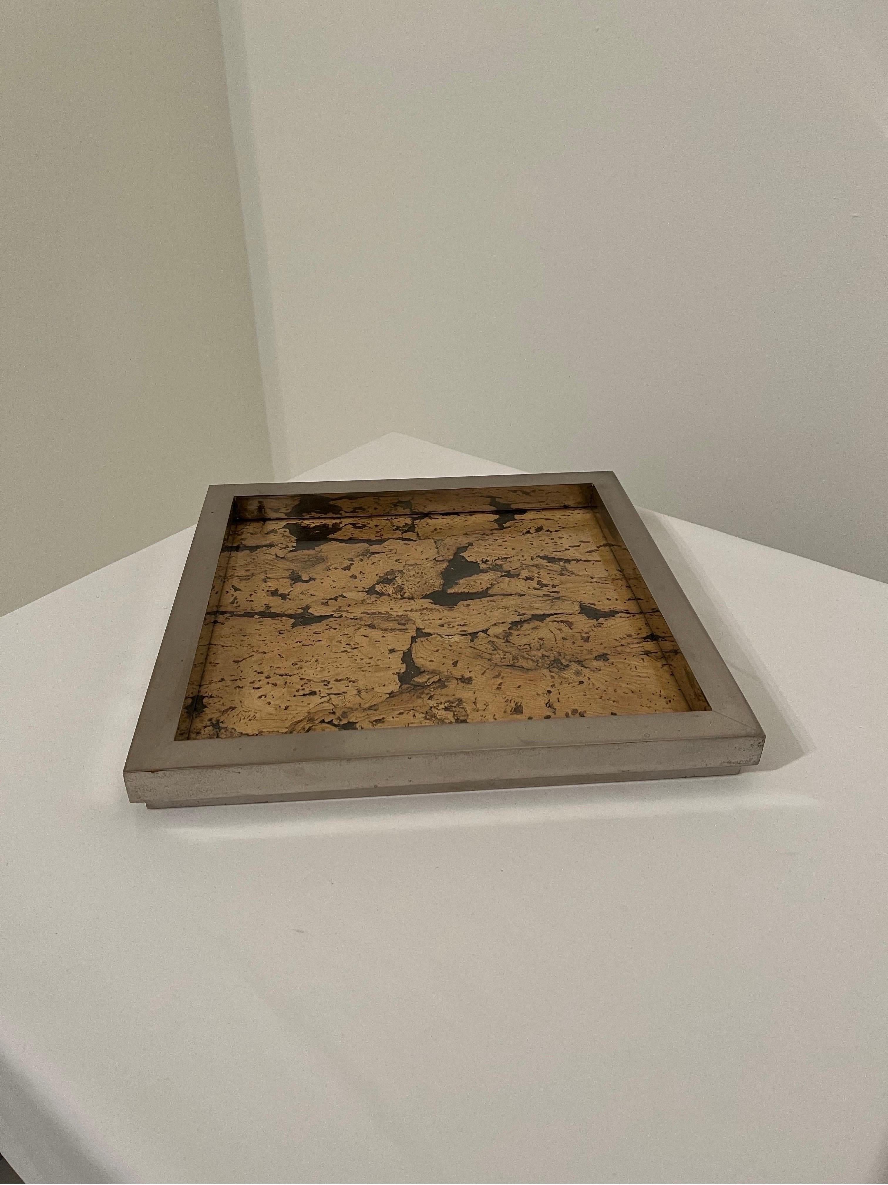 Chrome plated brass framed tray by Romeo Rega. 
Glass topped cork with acrylic base. 
Ageing and marks to chrome as shown to inner and outer of frame. 