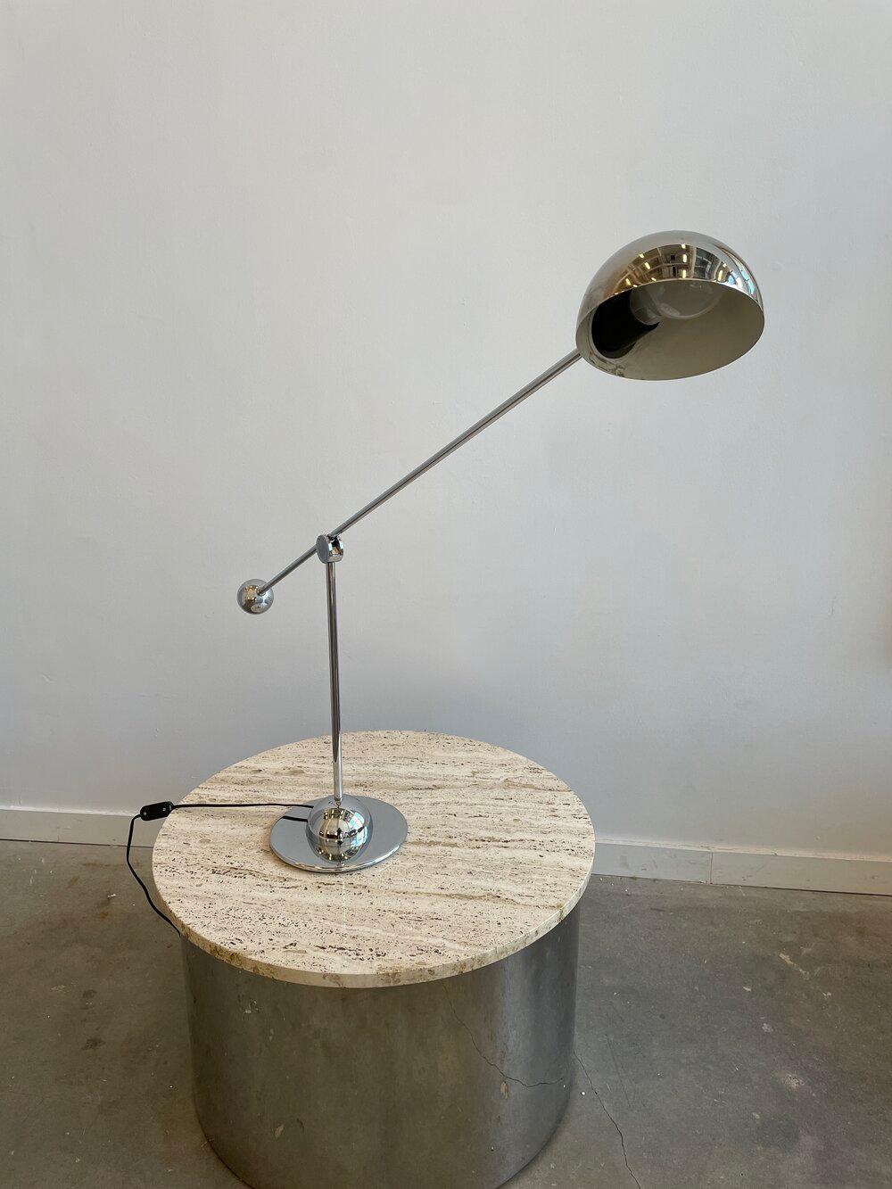 Chrome counterweight desk lamp by Optelma, Switzerland.

 