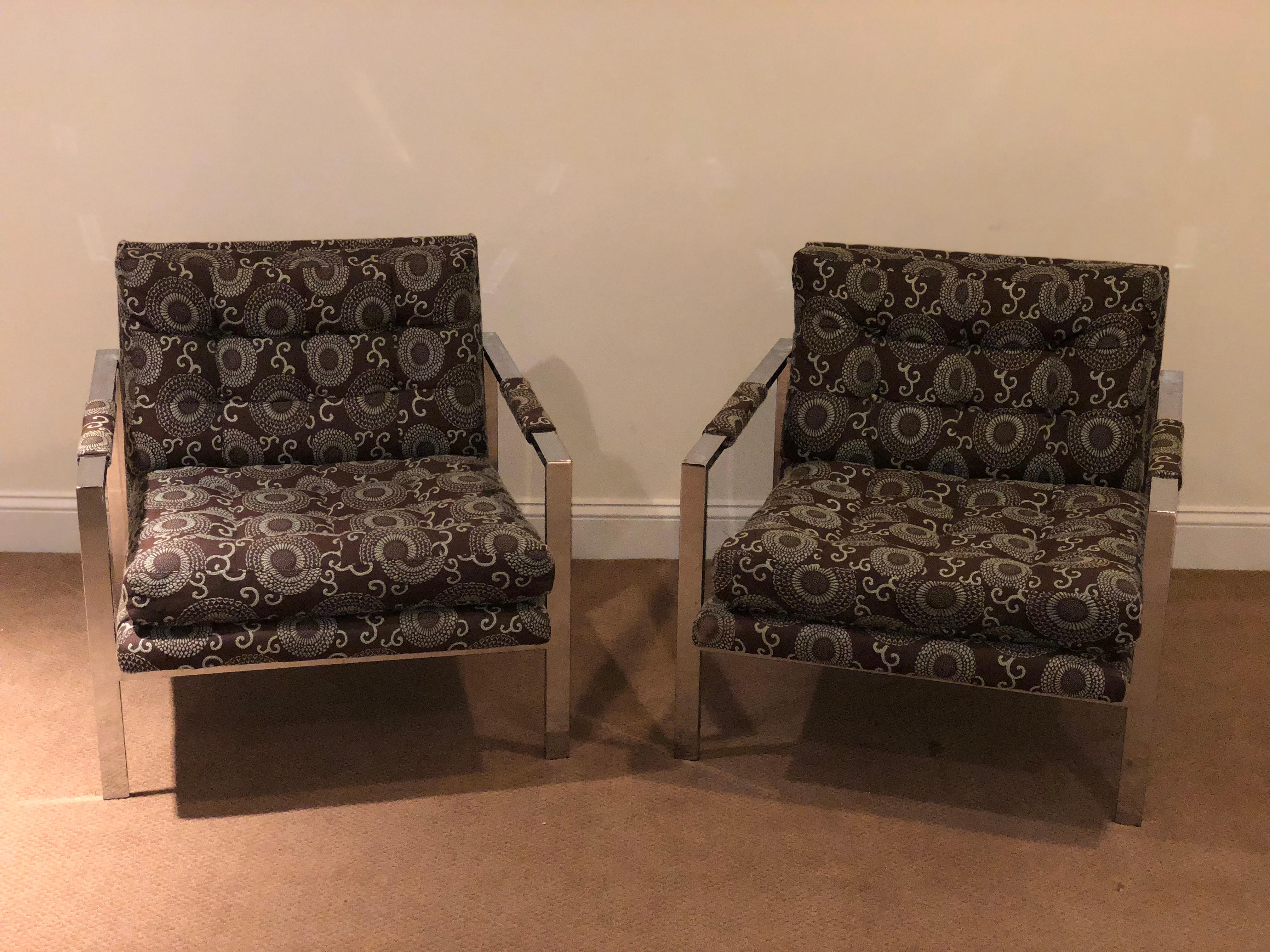 Fabulous pair of unsigned Milo Baughman for Thayer Coggin thick chrome cube lounge chairs. The upholstery is a chocolate brown with aqua blue design in good condition (some wear on the edges). The oversized thick chrome flat bars have a shiny