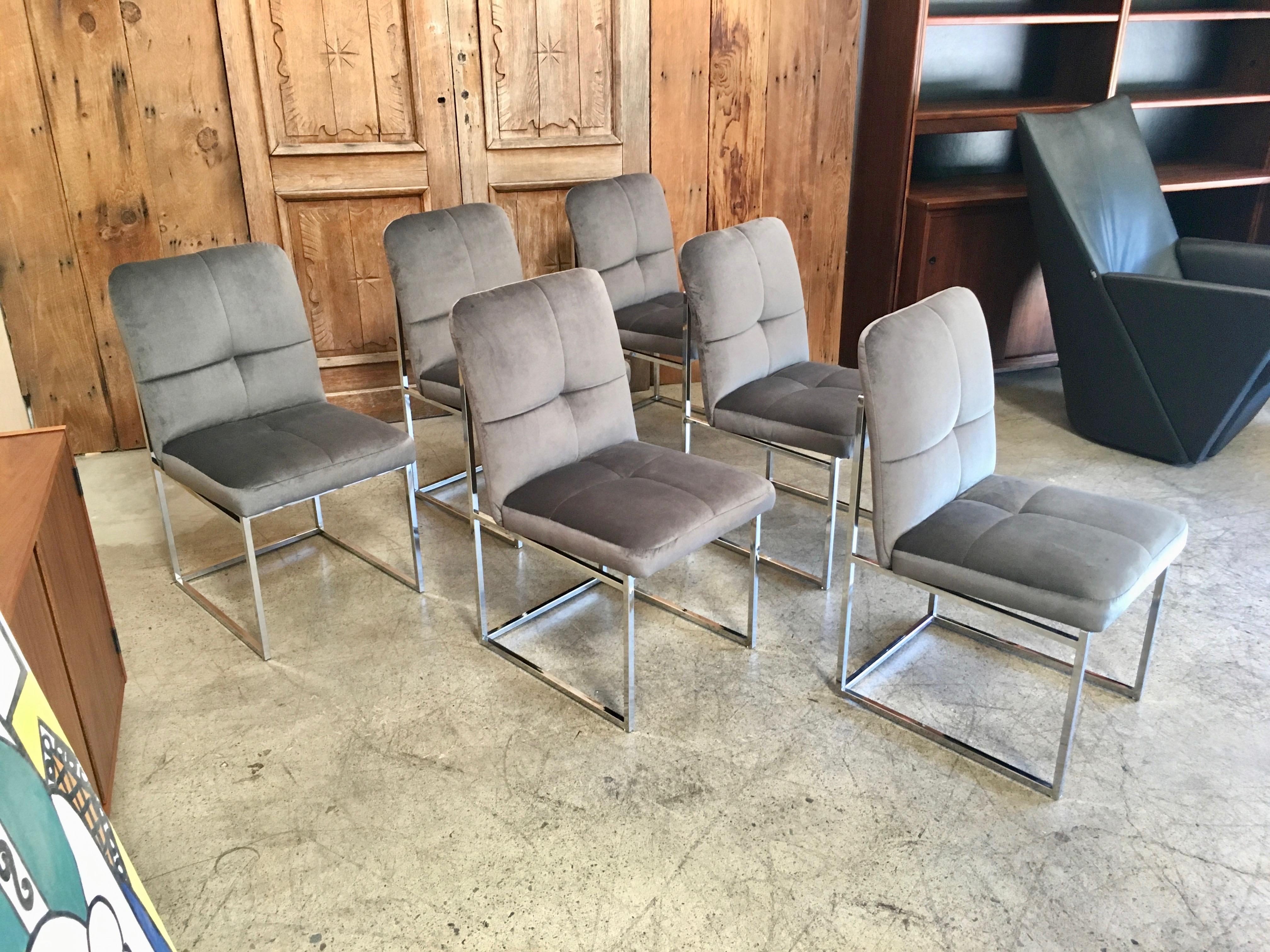 Set of six chrome dining chairs with new grey velvet Milo Baughman style.