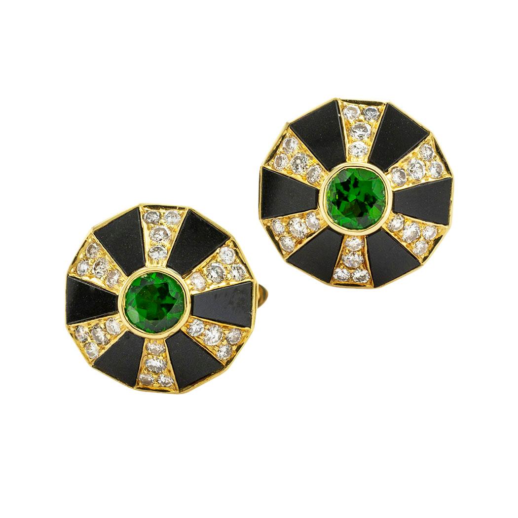 Chrome diopside diamond black onyx and yellow gold cufflinks by Denton. *

ABOUT THIS ITEM:  #C-DJ829D. Scroll down for specifications.  Reminiscent of kaleidoscopes, the faces of these cufflinks center on a round chrome diopside bezel set to