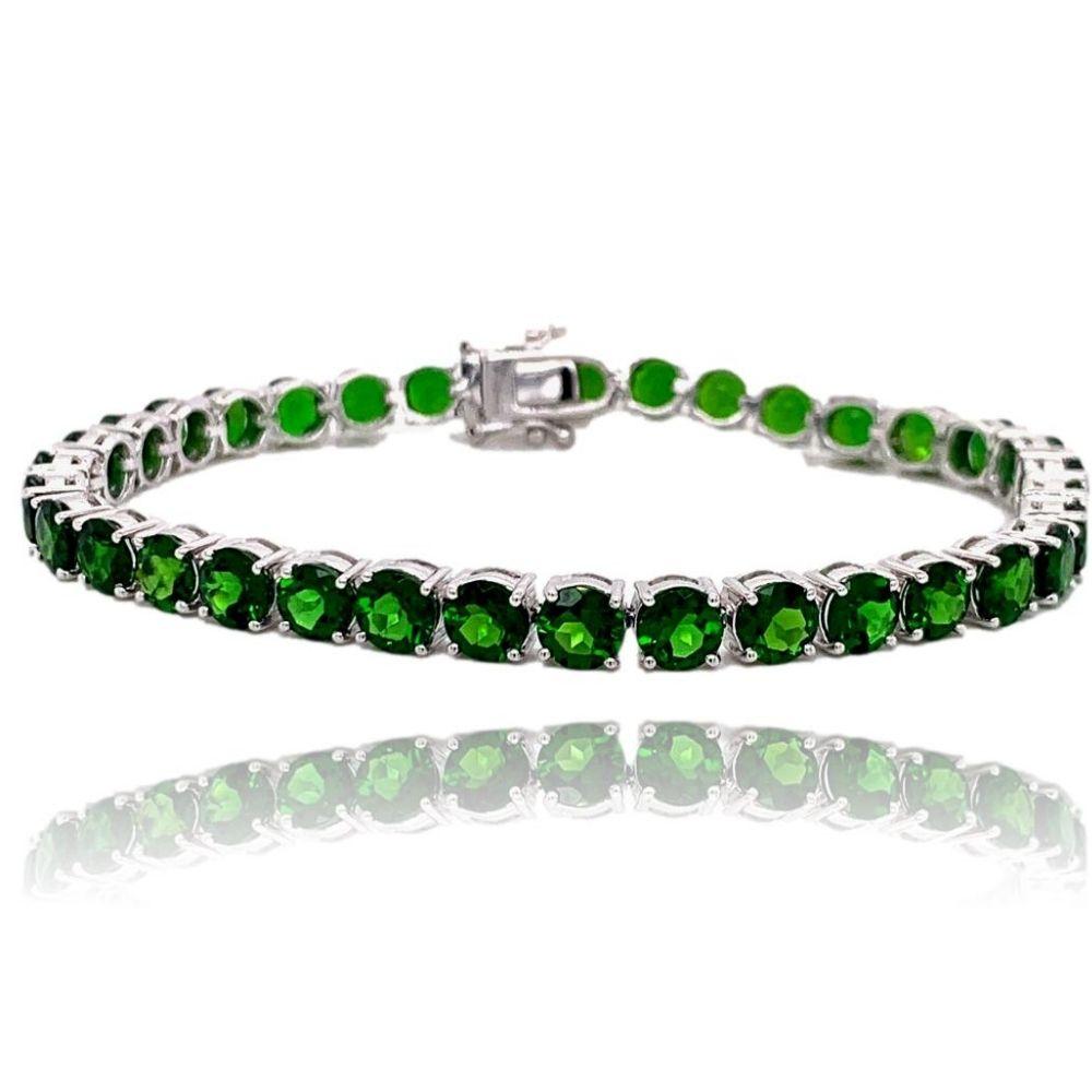This stunning 10K White Gold Tennis Bracelet has 35 round 5.0mm vibrant natural Chrome Diopside stones all with 4 prong setting. The bracelet is 7
