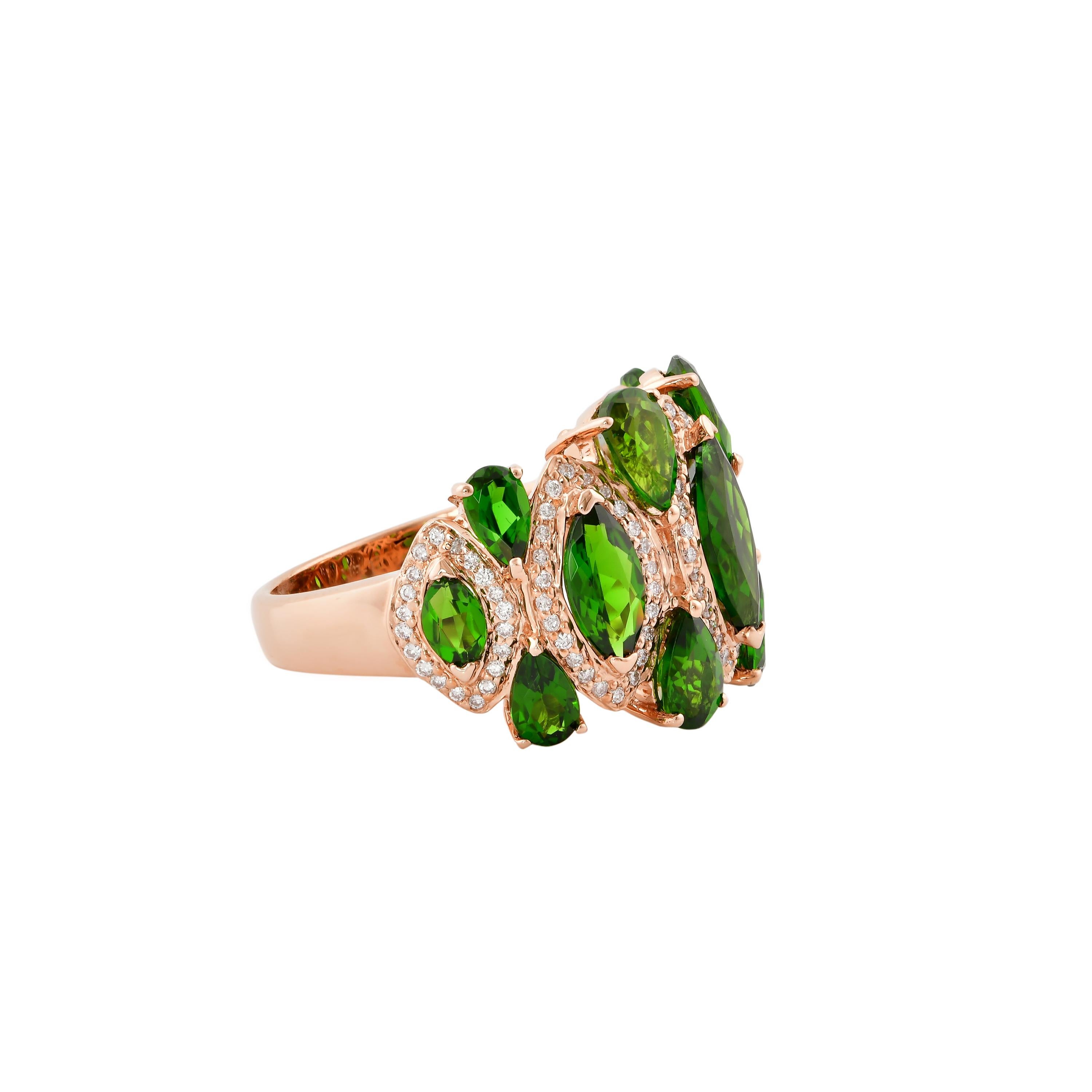 Sunita Nahata presents a collection of fancy cocktail rings with gorgeous gemstones. This ring uniquely pairs pear and marquise shaped chrome diopside accented with diamonds. The banded design makes the a striking yet subtle cocktail ring that will