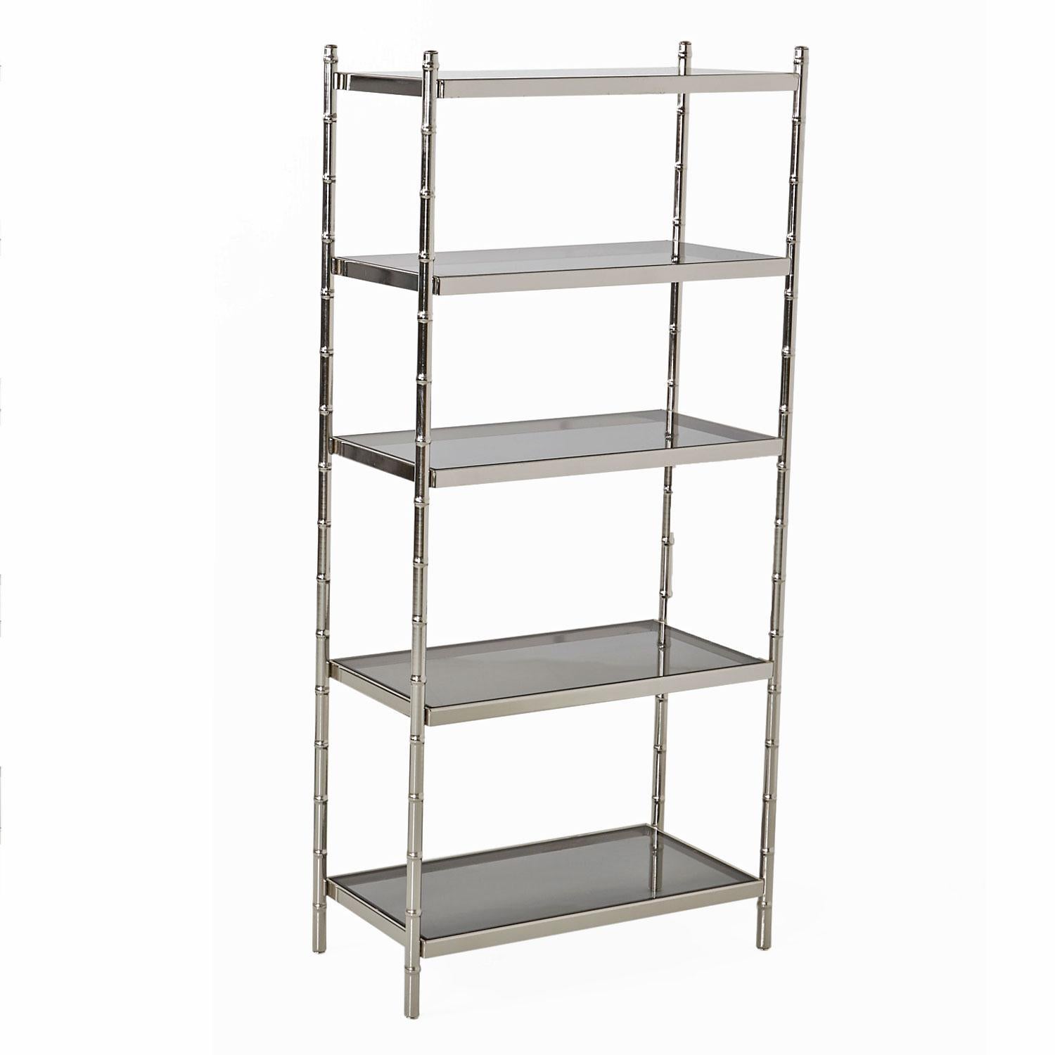 Hollywood Regency Maison Bague's style chrome étagère set sold individually. This pair of identical 1970s shelving units are unique in their diminutive proportions. Large enough to be practical, but small enough to fit anywhere. Rarely do we find a