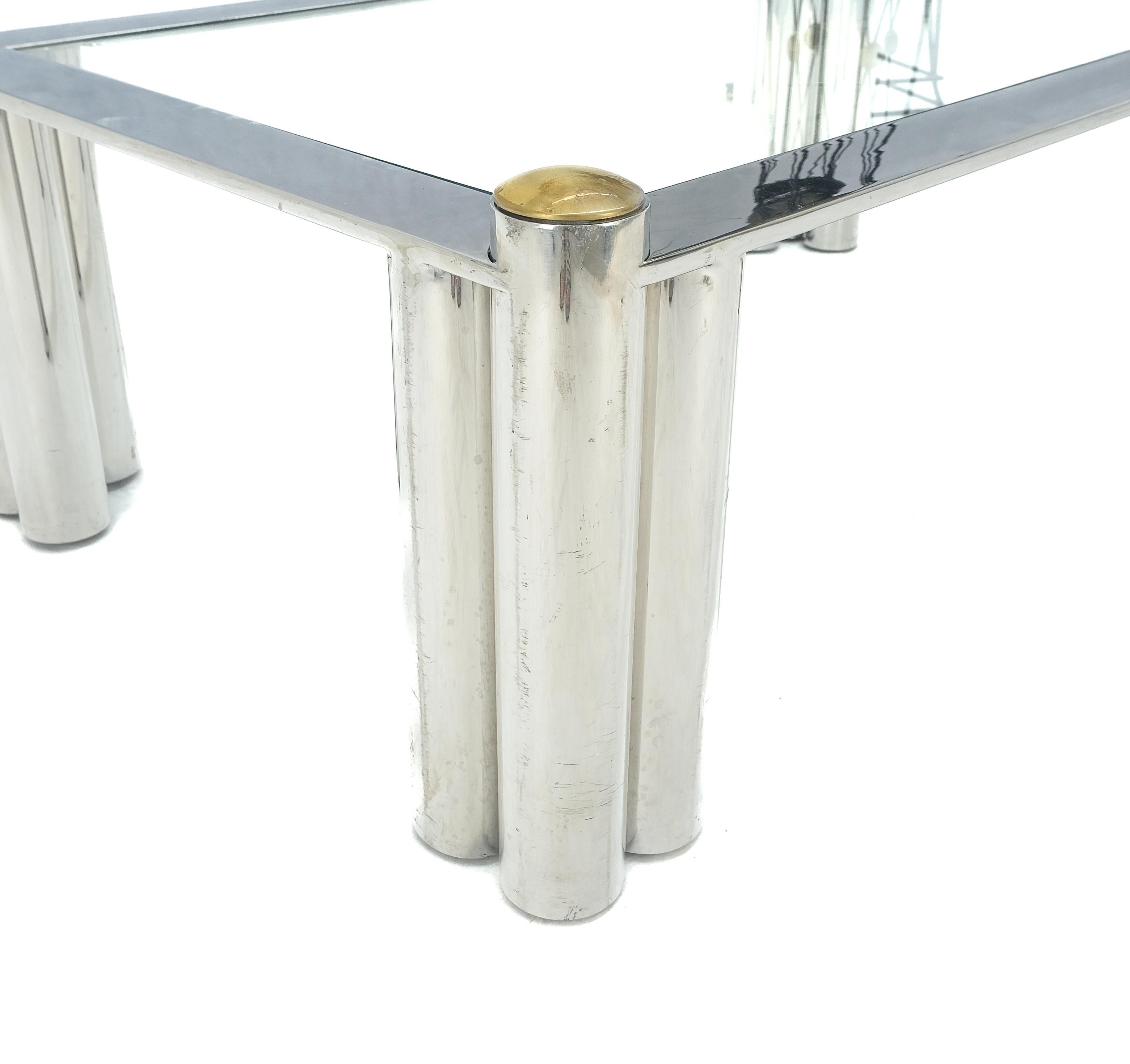 Chrome Finish Stainless Steel Base Triple Cylinder Leg Glass Top Rectangle Coffee Table MINT!
Stylish stainless steel mid century modern rectangular coffee table with brass finials. 
High quality metal workmanship. 