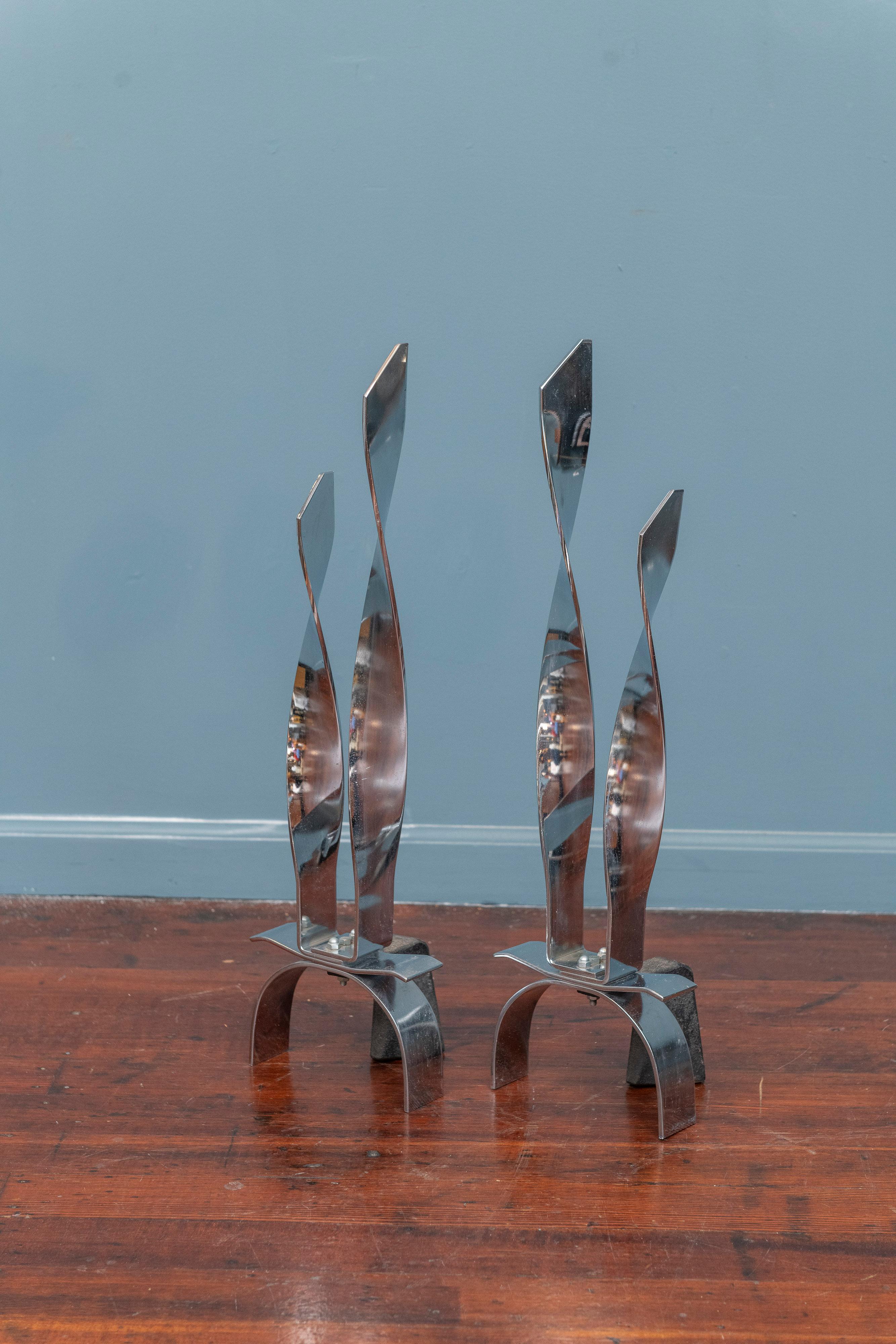 Chrome and steel flame form andirons. Stylish combination of form with a function, in very good original condition.