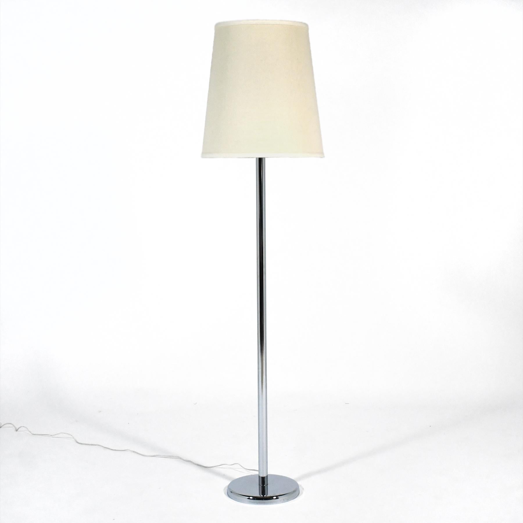 This clean-lined chrome modernist floor lamp from the late 1960s is by George Kovacs. It is very well made and in very good original condition. It is fitted with a 5 bulb socket head that has a 3-way switch to offer the desired amount of