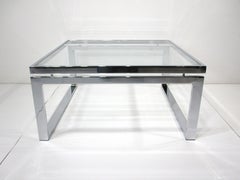 Chrome / Glass Coffee Table in the style of Milo Baughman
