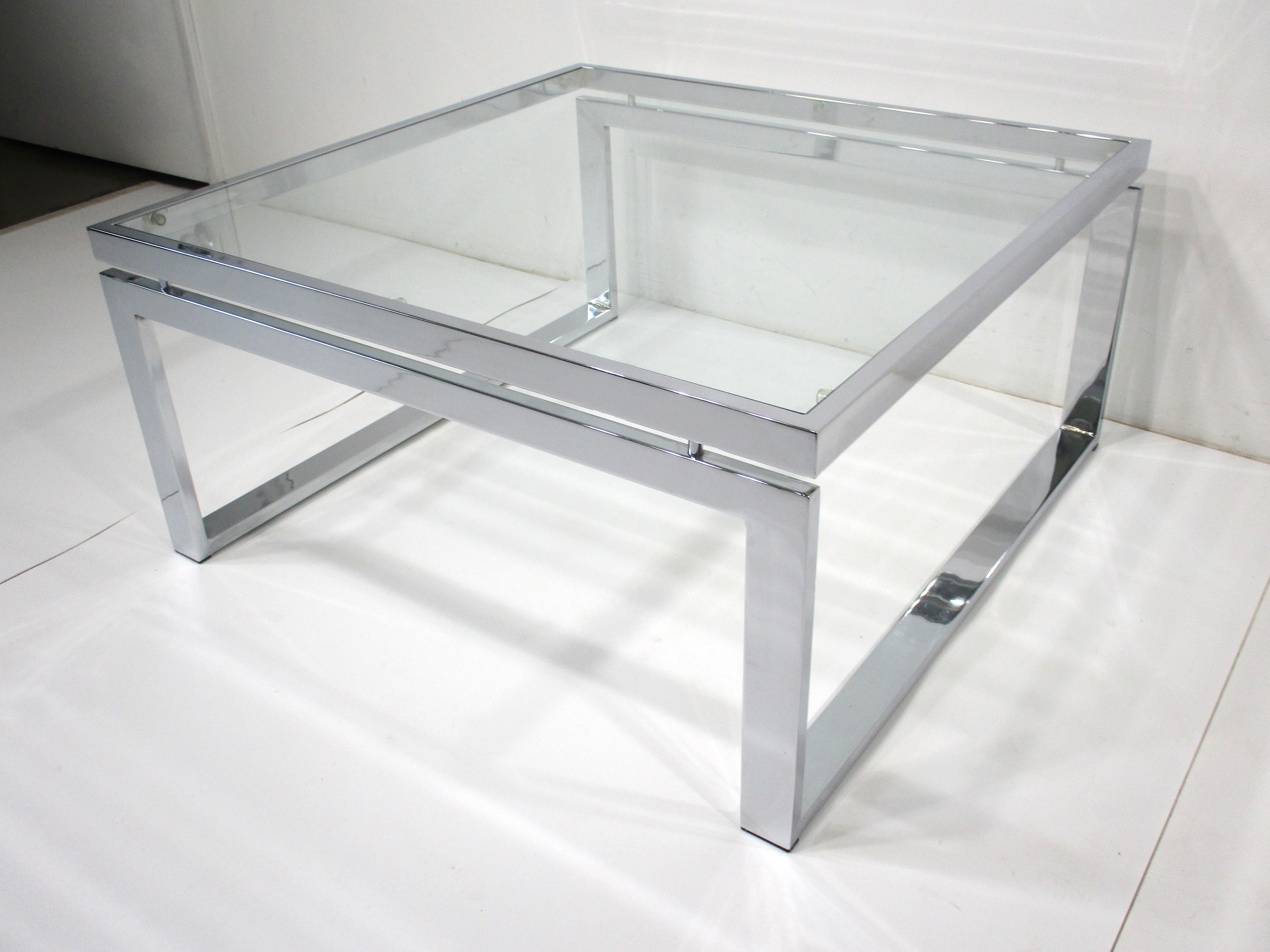 Chrome / Glass Coffee Table in the style of Milo Baughman  1