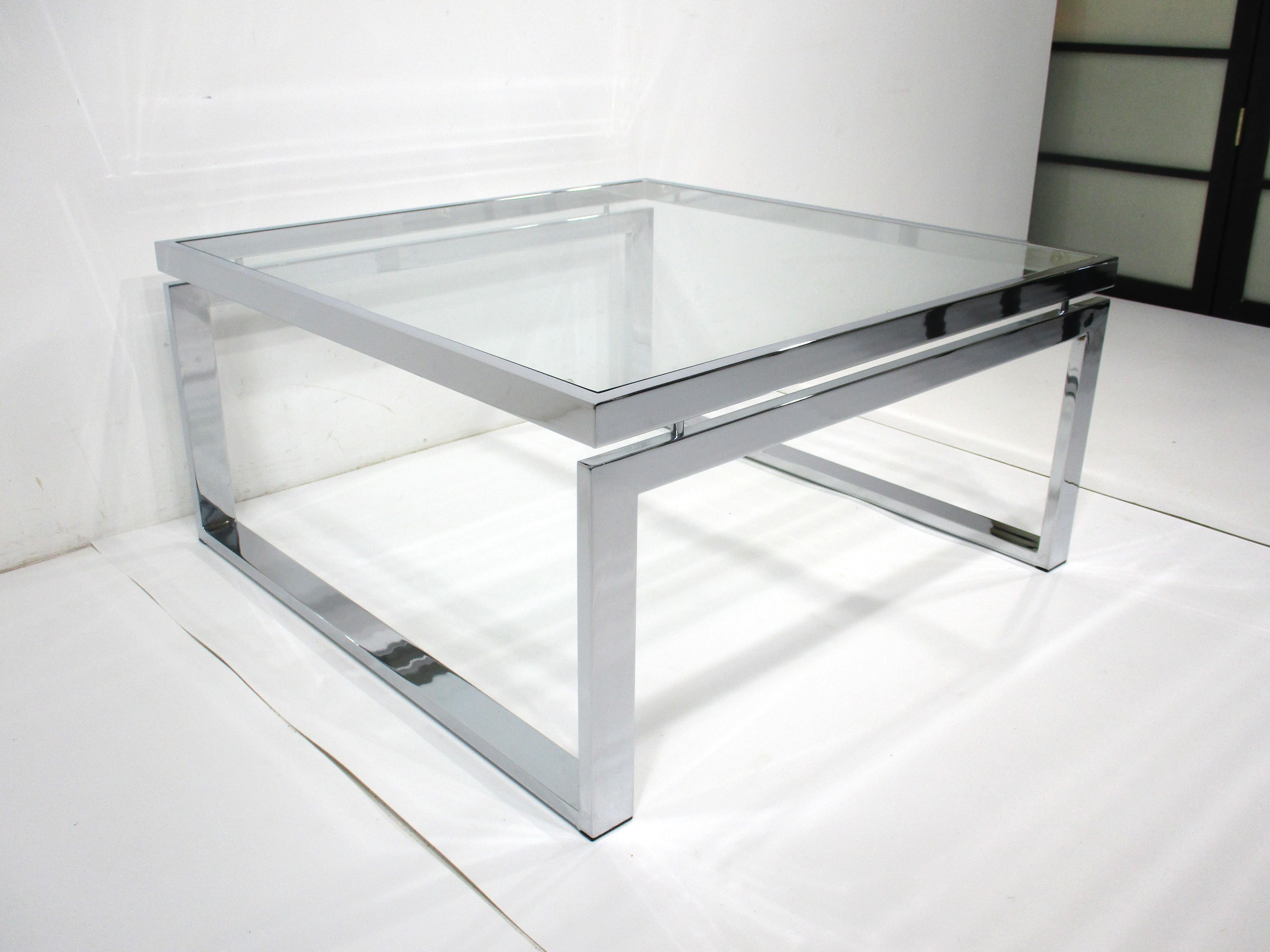Chrome / Glass Coffee Table in the style of Milo Baughman  2
