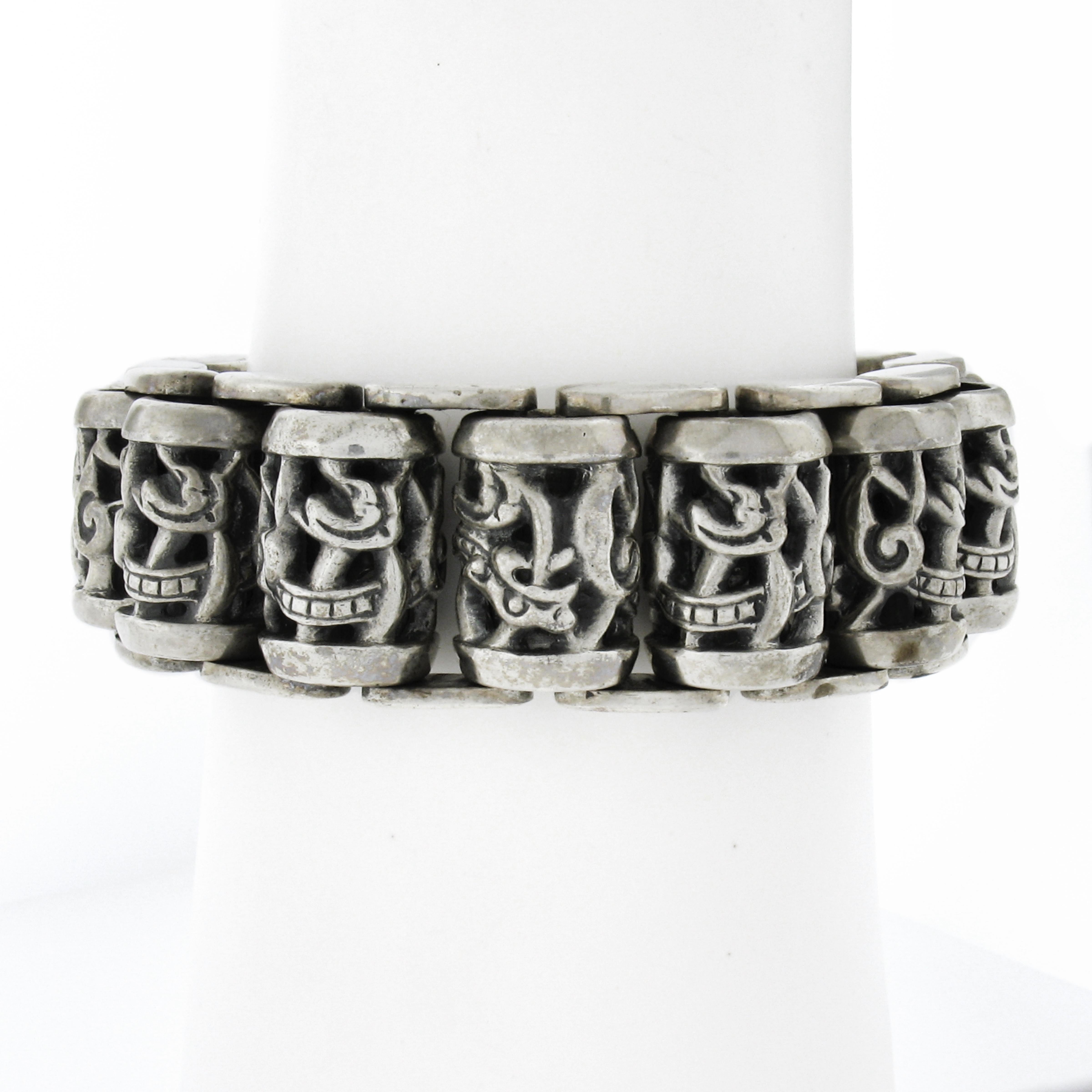 This bold statement piece by Chrome Hearts is from their Celtic collection and features roller cylinder links that are detailed with dragons and open designs throughout. The bracelet is heavy, wide and is guaranteed to stand out with its bold