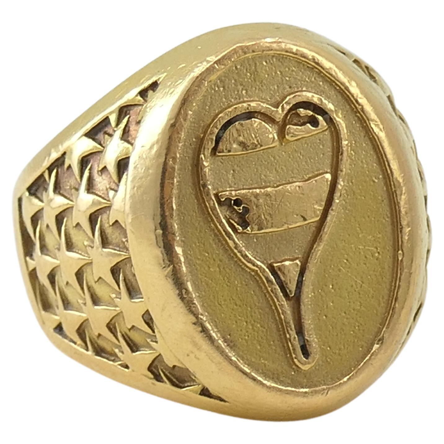 An emblematic Matty Boy Heart Ring in 22k gold. One of the most sought-after Chrome Hearts rings. 
Circa 2017 (stamped). 
Size 8; weighs 37.5 grams. 
Comes with the original pouch.

About Chrome Hearts 
Chrome Hearts was founded in 1988 by Richard