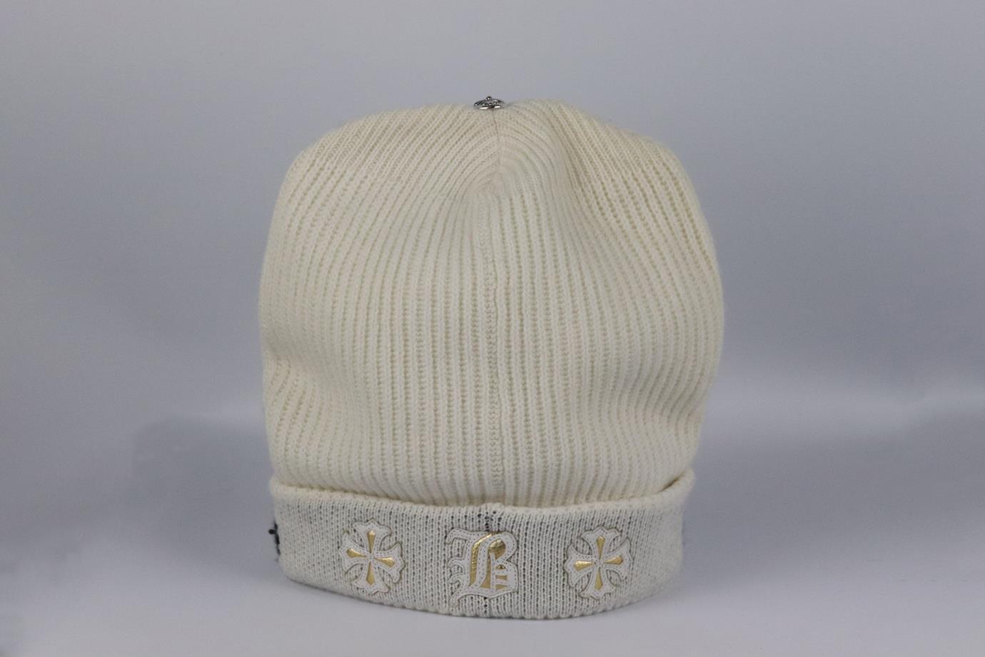 Chrome Hearts + Bella Hadid appliquéd ribbed cashmere beanie. Cream, black and gold. Slips on. 100% Cashmere. Does not come with dustbag or box. Size: One Size. Length: 11 in. Circumference: 19 in. Very good condition - No sign of wear; see pictures.