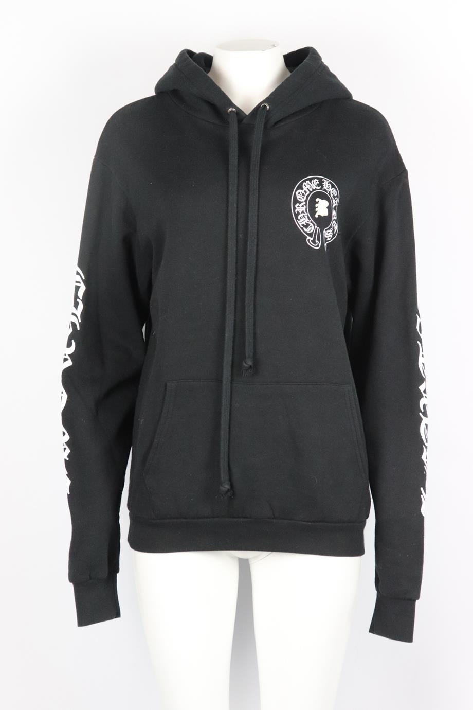 Chrome Hearts + Bella Hadid printed cotton jersey hoodie. Black and white. Long sleeve, crewneck. Slips on. 100% Cotton. Size: Medium (UK 10, US 6, FR 38, IT 42). Bust: 42 in. Waist: 40 in. Hips: 34 in. Length: 26.5 in. Very good condition - No sign