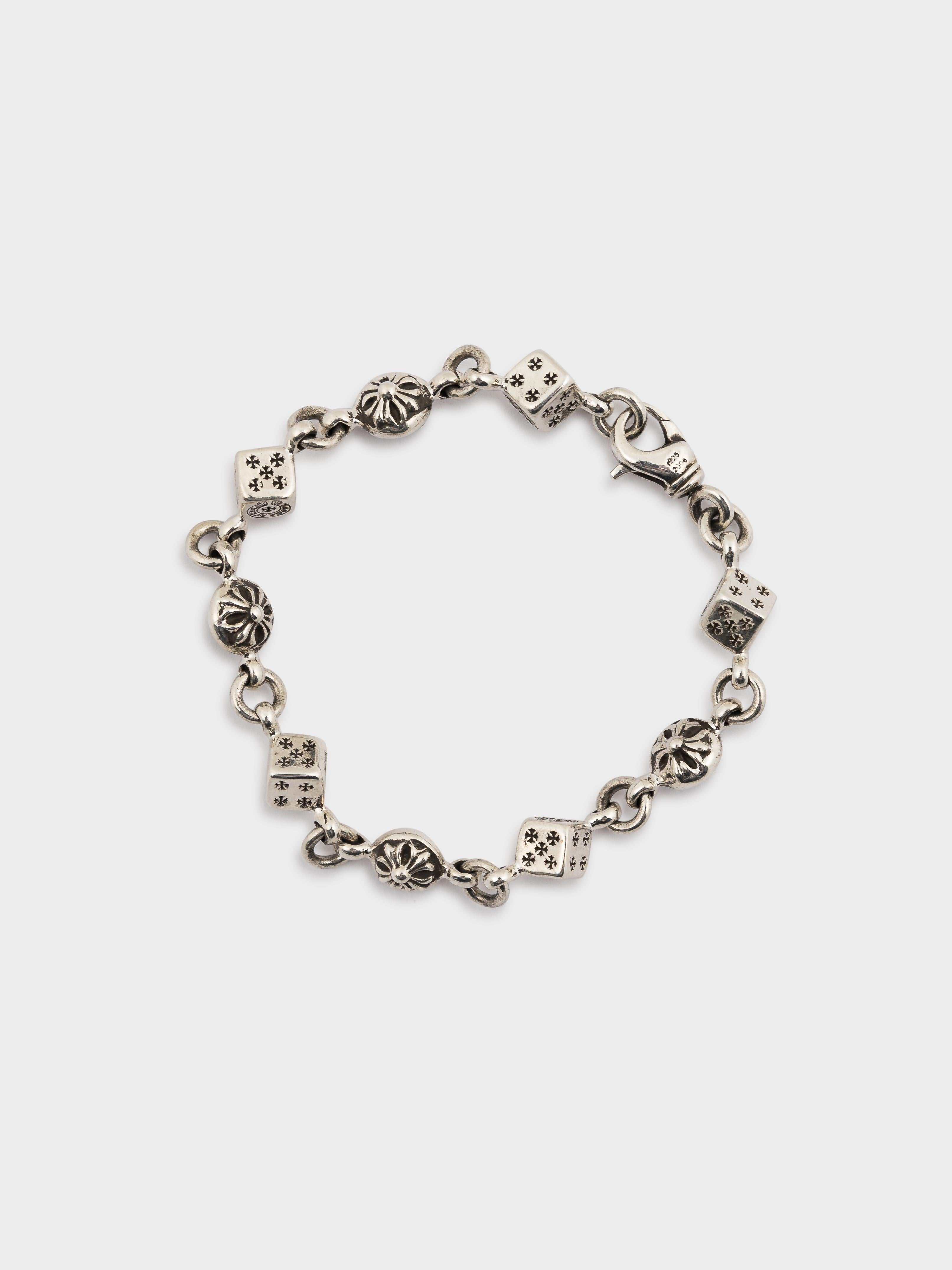 ✓ Authenticated

Our trained in-house authentication experts have reviewed this item to ensure that it is original. We guarantee its authenticity.

Here is a gently used Dice Bracelet from Chrome Hearts.

Condition: Like new 

